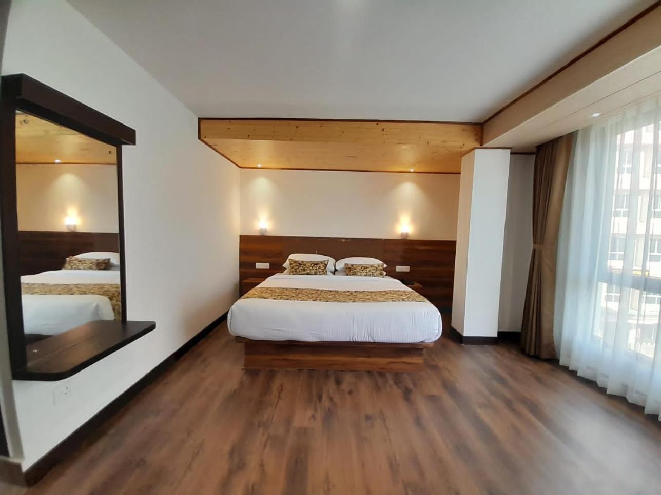 Deluxe Room - Photo 2