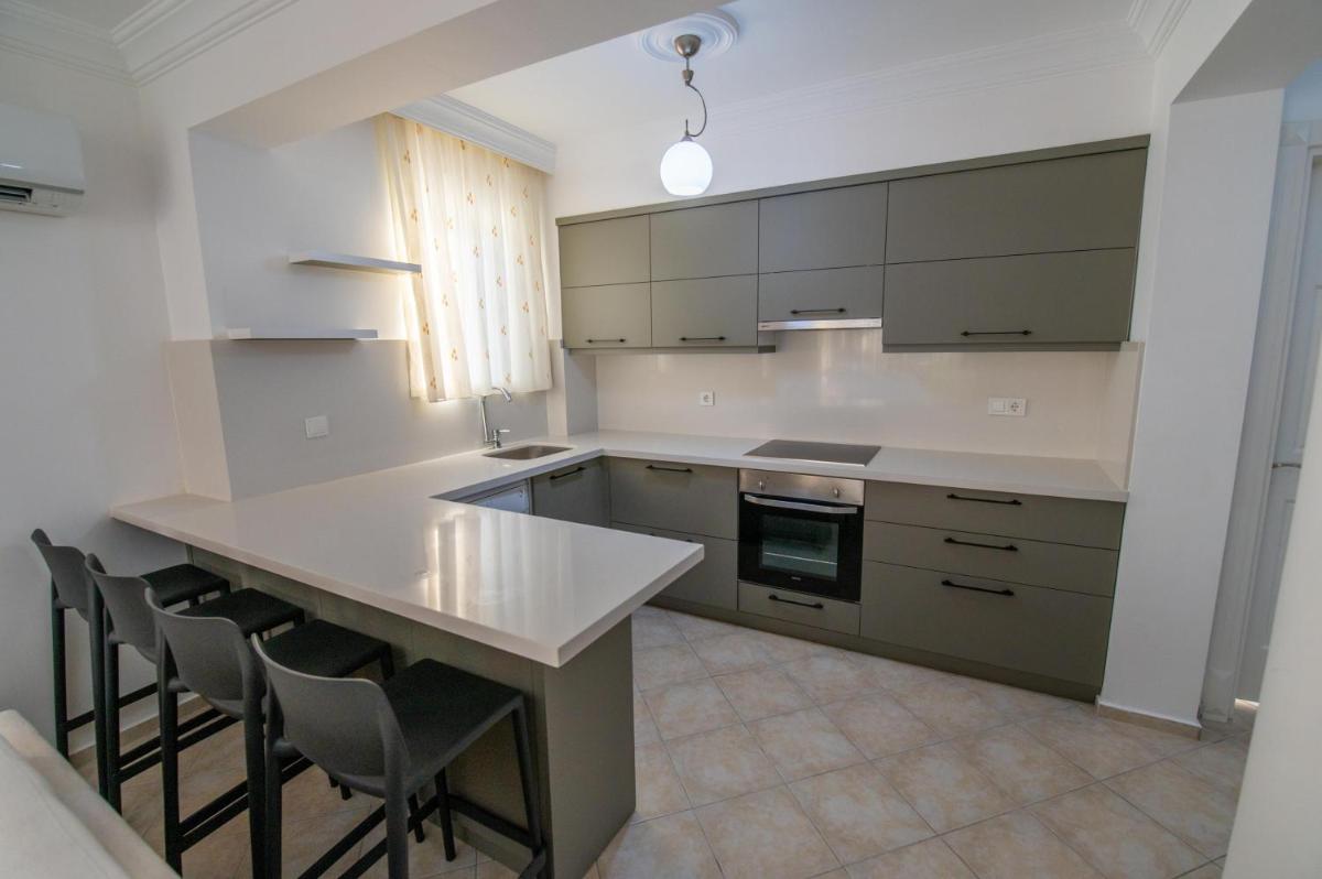 Three-Bedroom Apartment - Photo 30