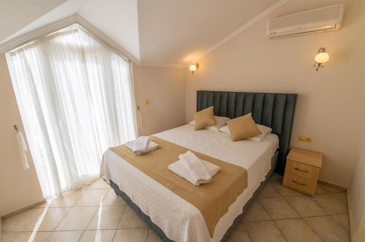 Two-Bedroom Apartment - Photo 12