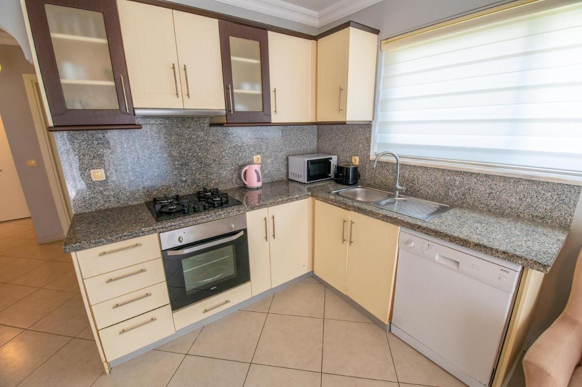 Three-Bedroom Apartment - Photo 33