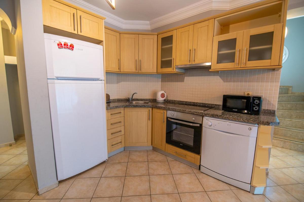 Three-Bedroom Apartment - Photo 34