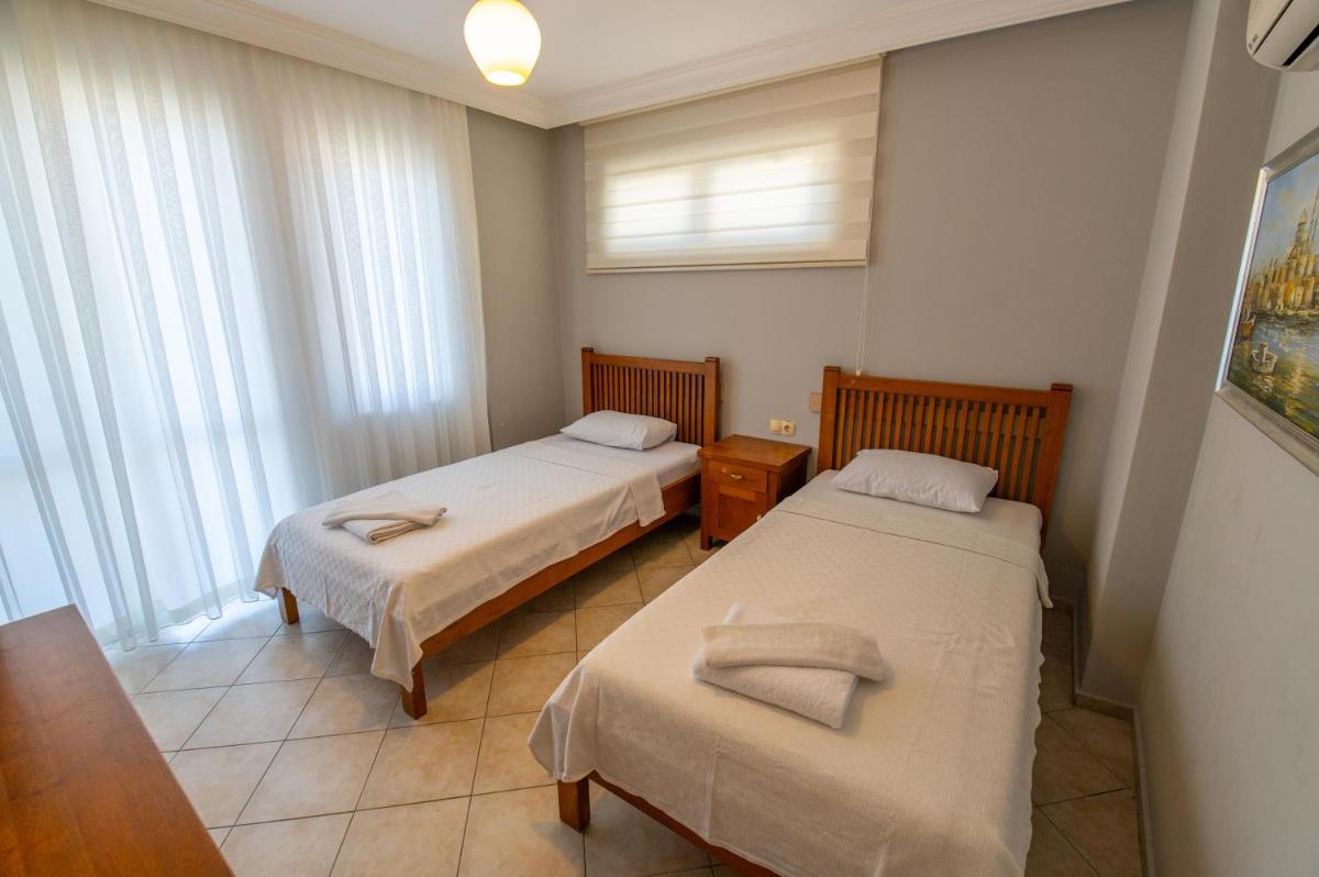 Three-Bedroom Apartment - Photo 12