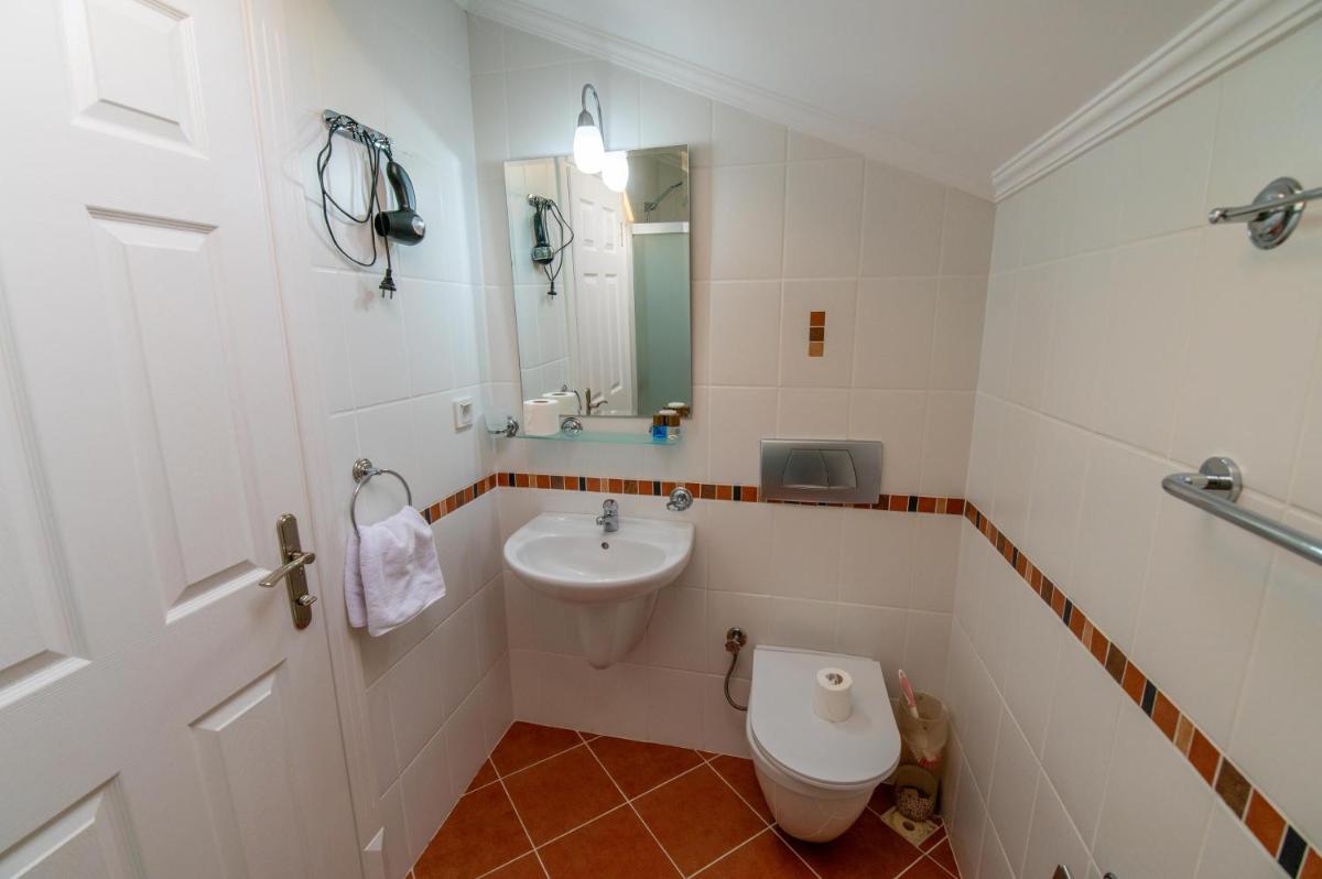 Three-Bedroom Apartment - Photo 16
