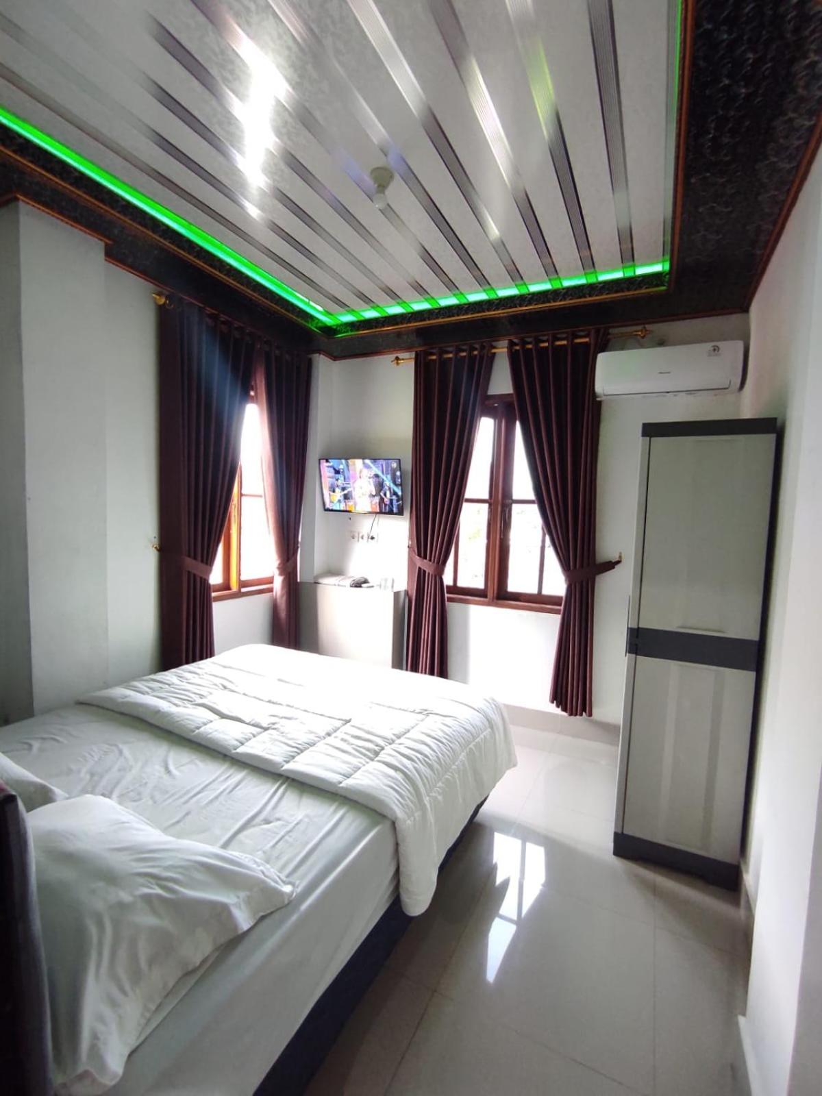 Deluxe Room - Photo 1