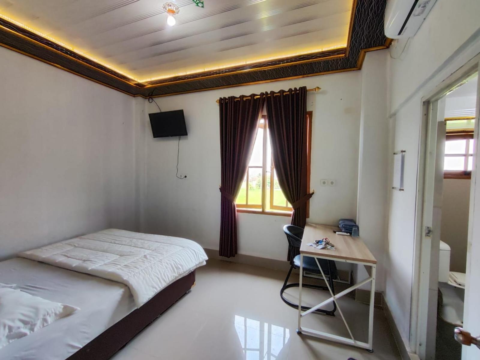 Deluxe Room - Photo 6