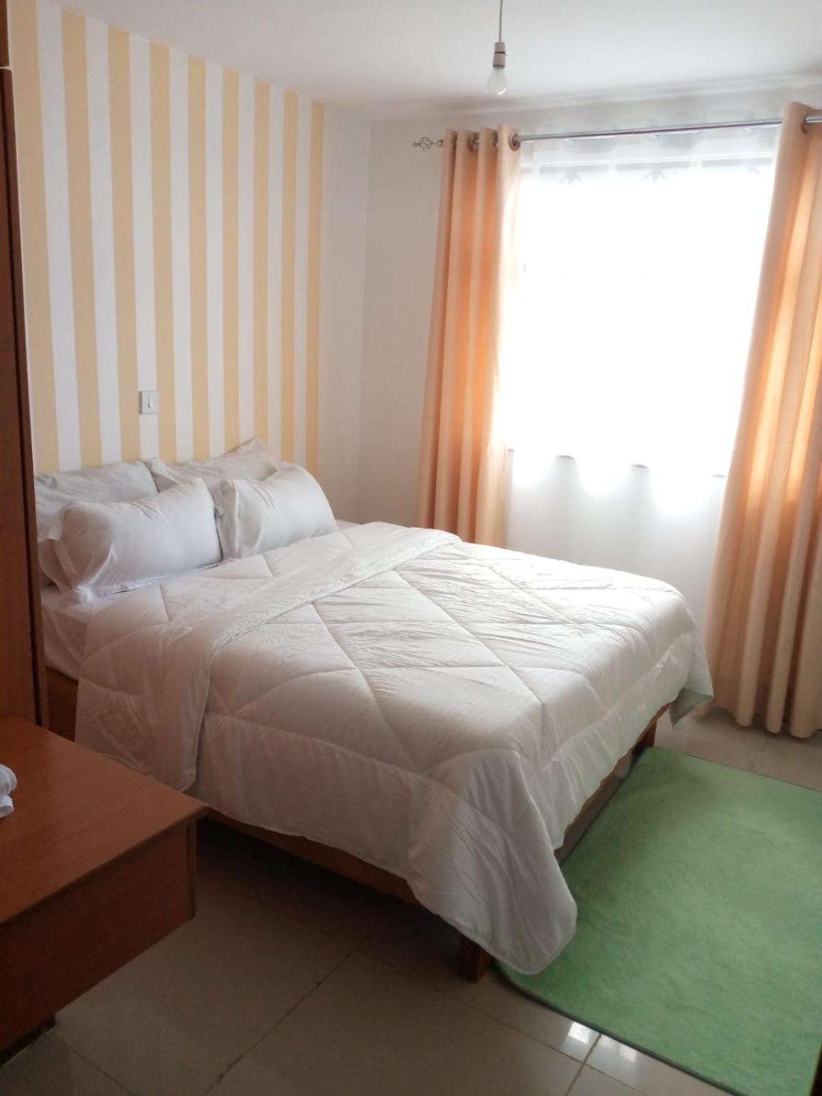 Three-Bedroom Apartment - Photo 2