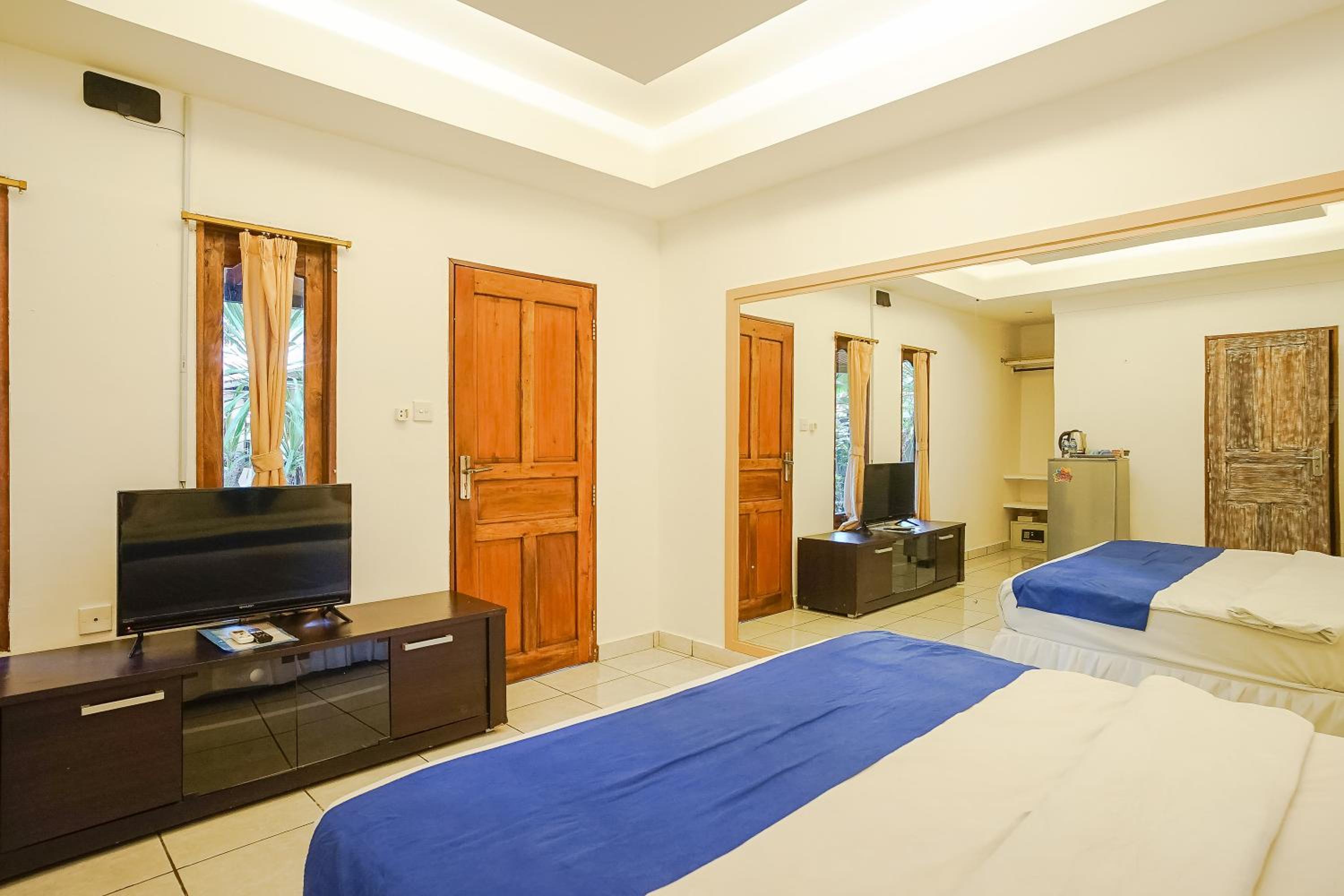 Deluxe Room - Photo 10