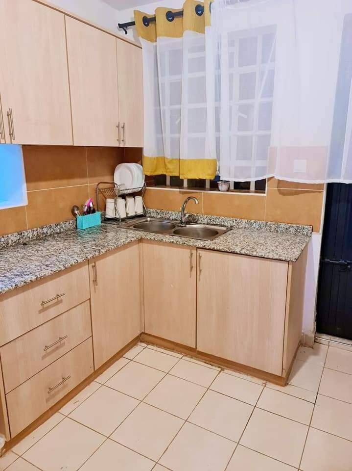 Three-Bedroom Apartment - Photo 2