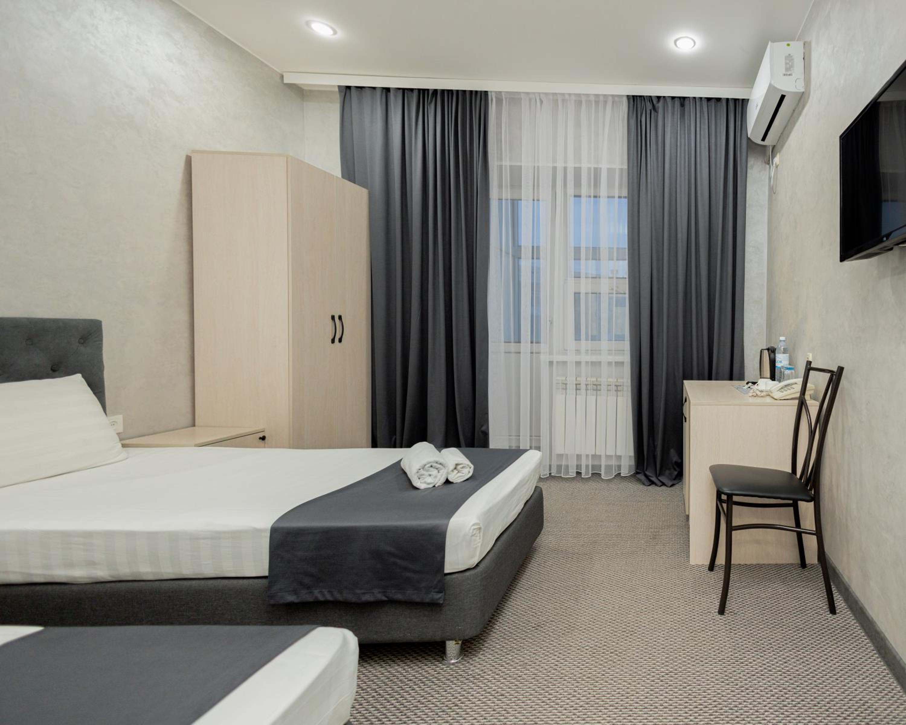 Standard Twin Room - Photo 4