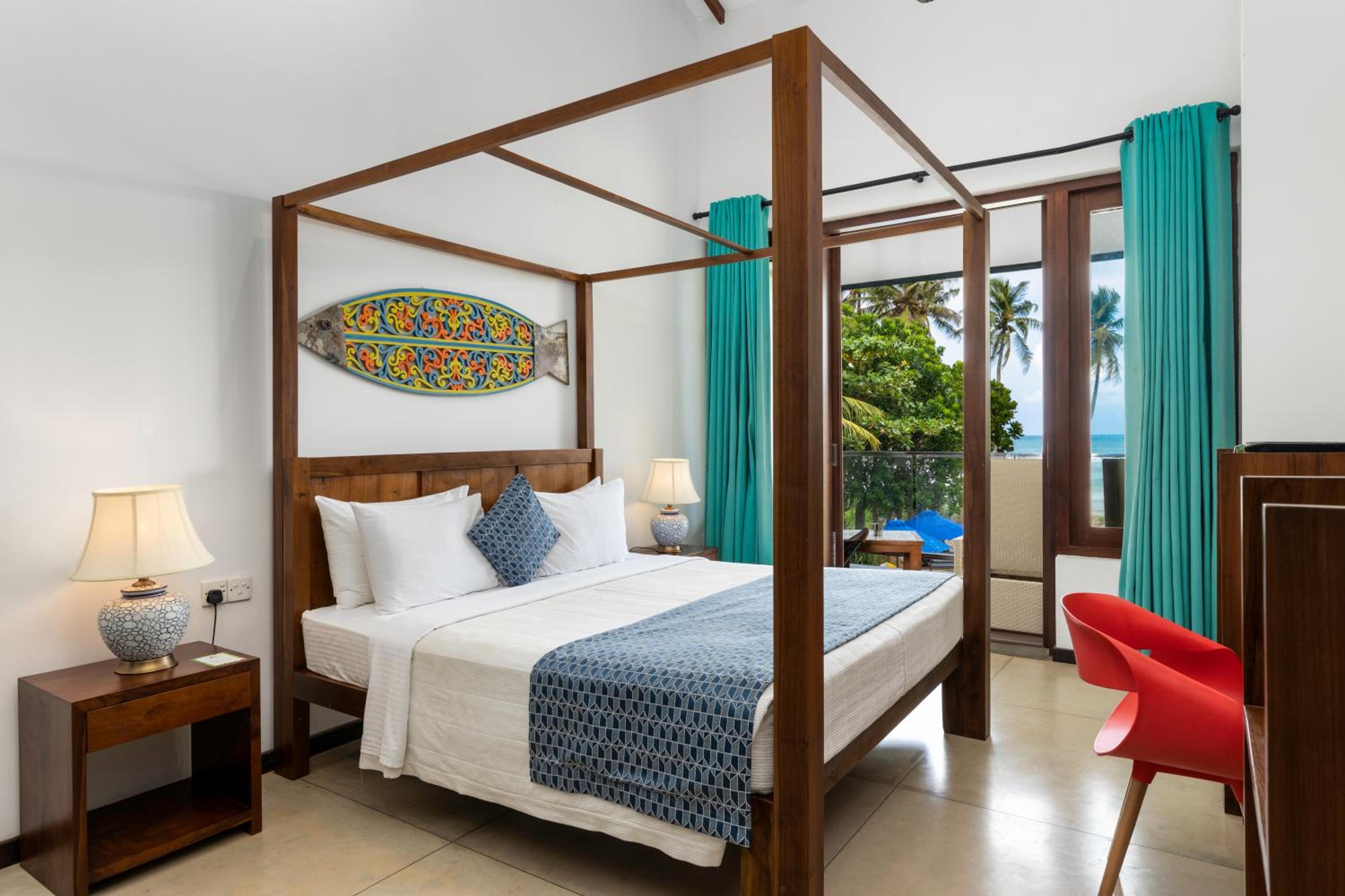 Deluxe Double Room with with refreshing mocktails, beachfront dining, evening tea with snacks at Café Surf, and homemade ice cream.