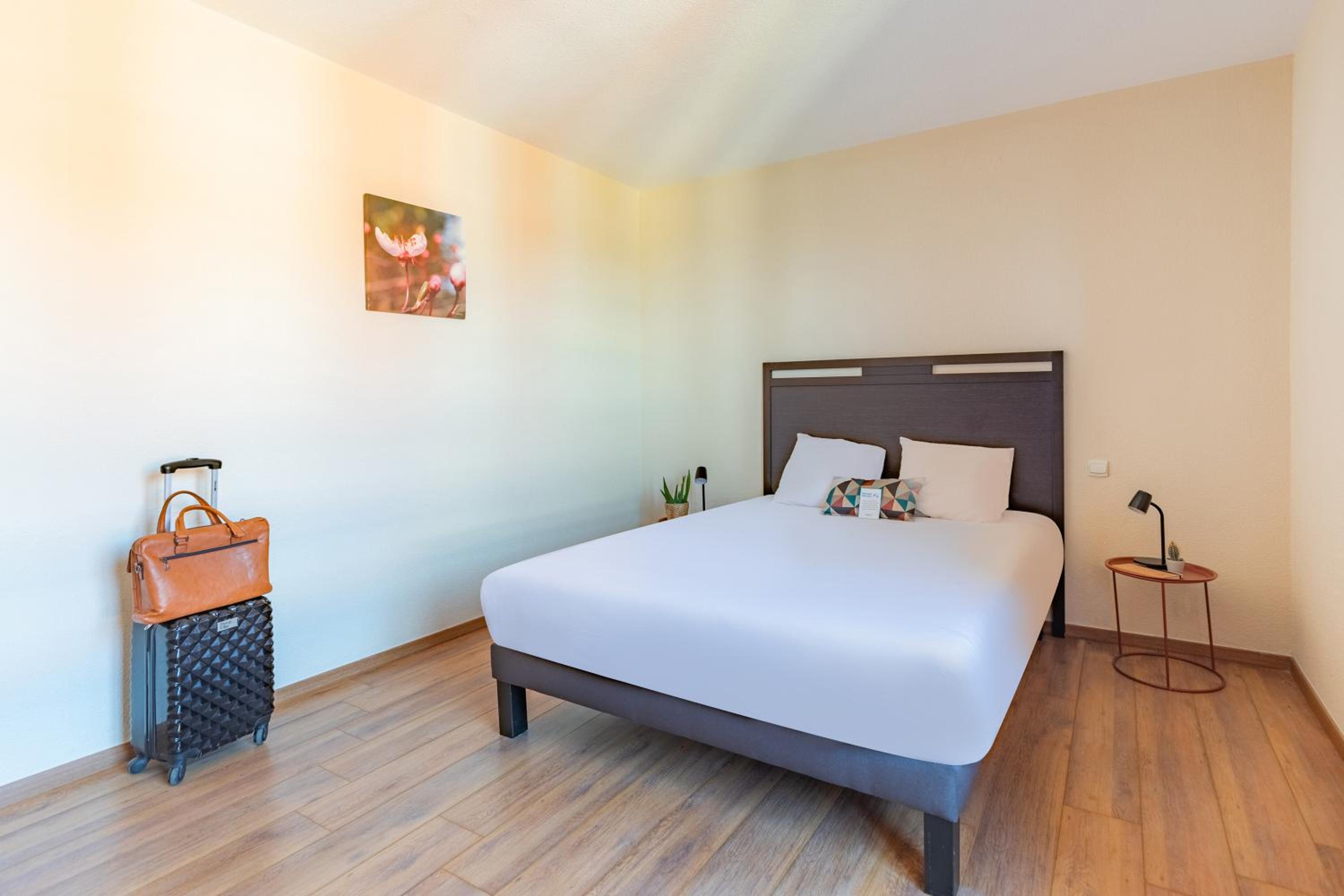 Three-Bedroom Apartment - Photo 8