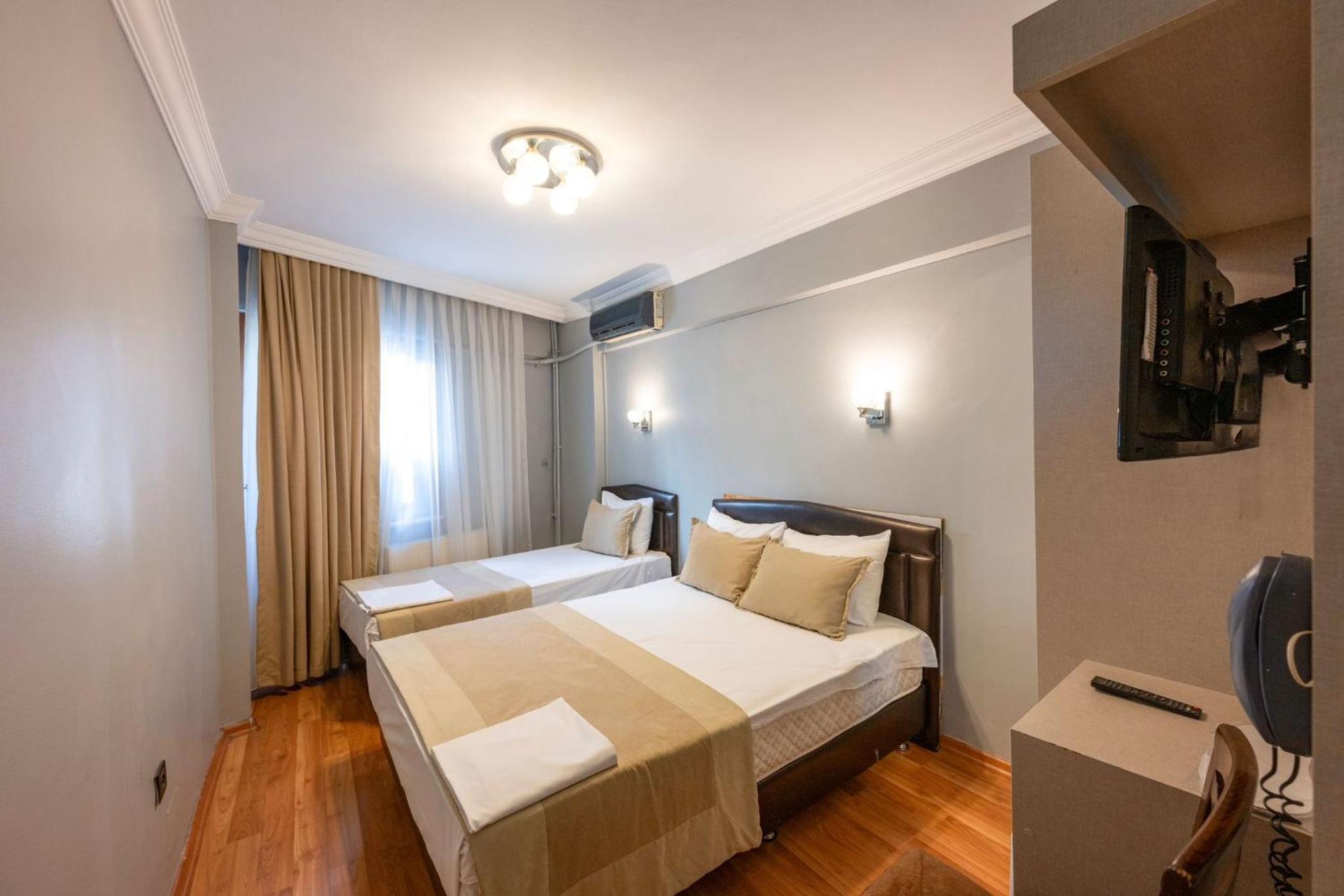 Comfort Triple Room with Shower photo 1