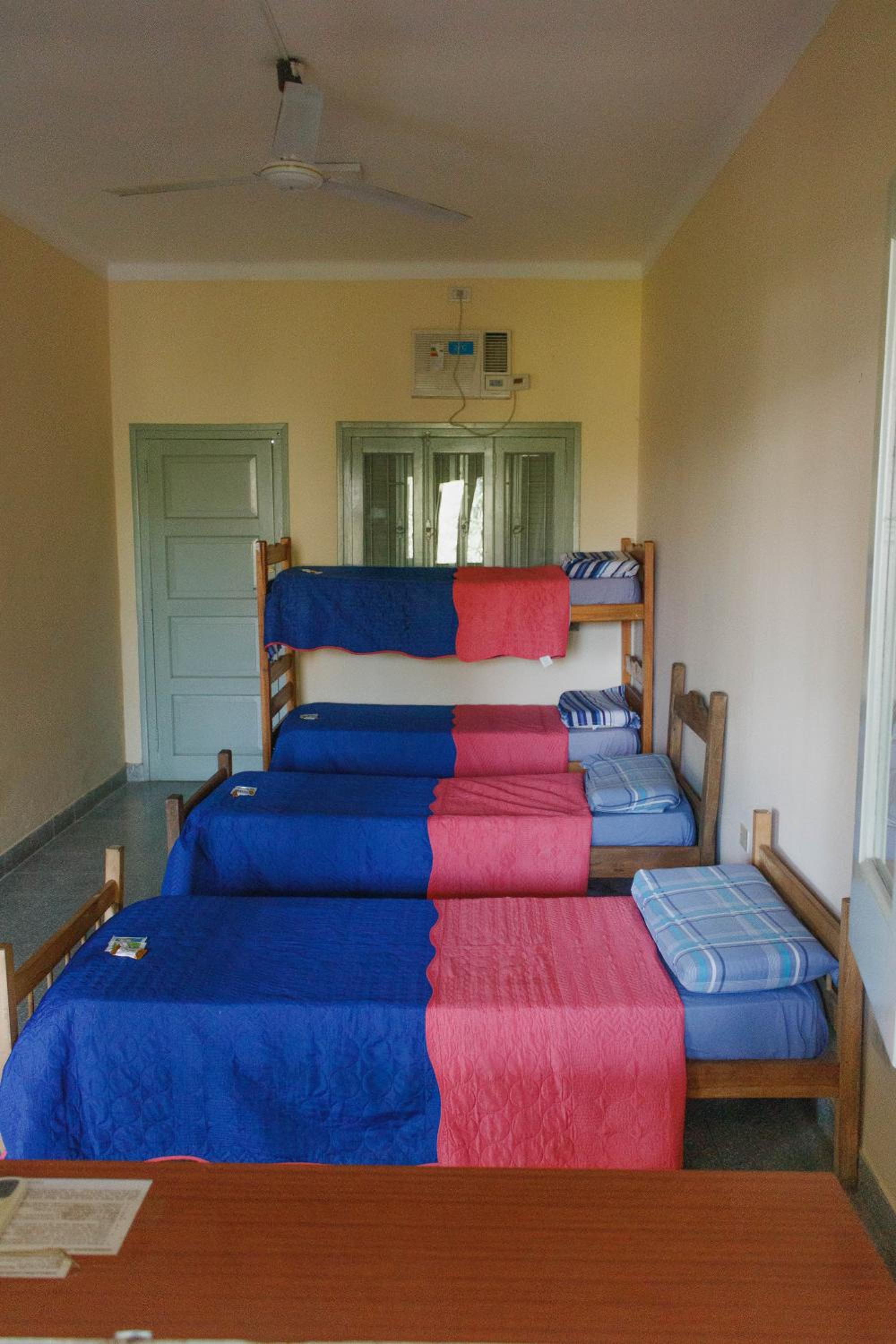 Single Bed In Dormitory Room photo 1