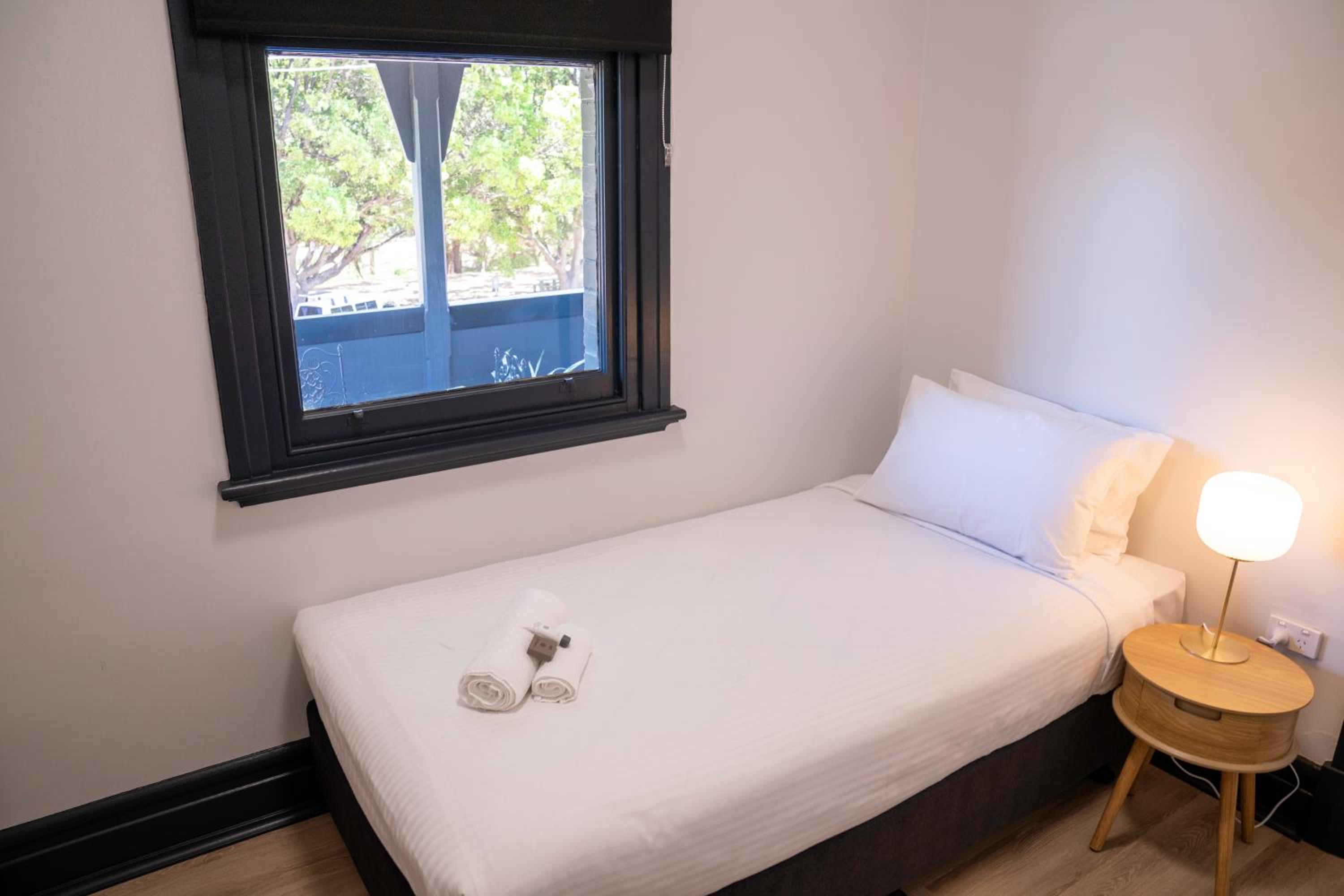 Single Room with Shared Shower and Toilet