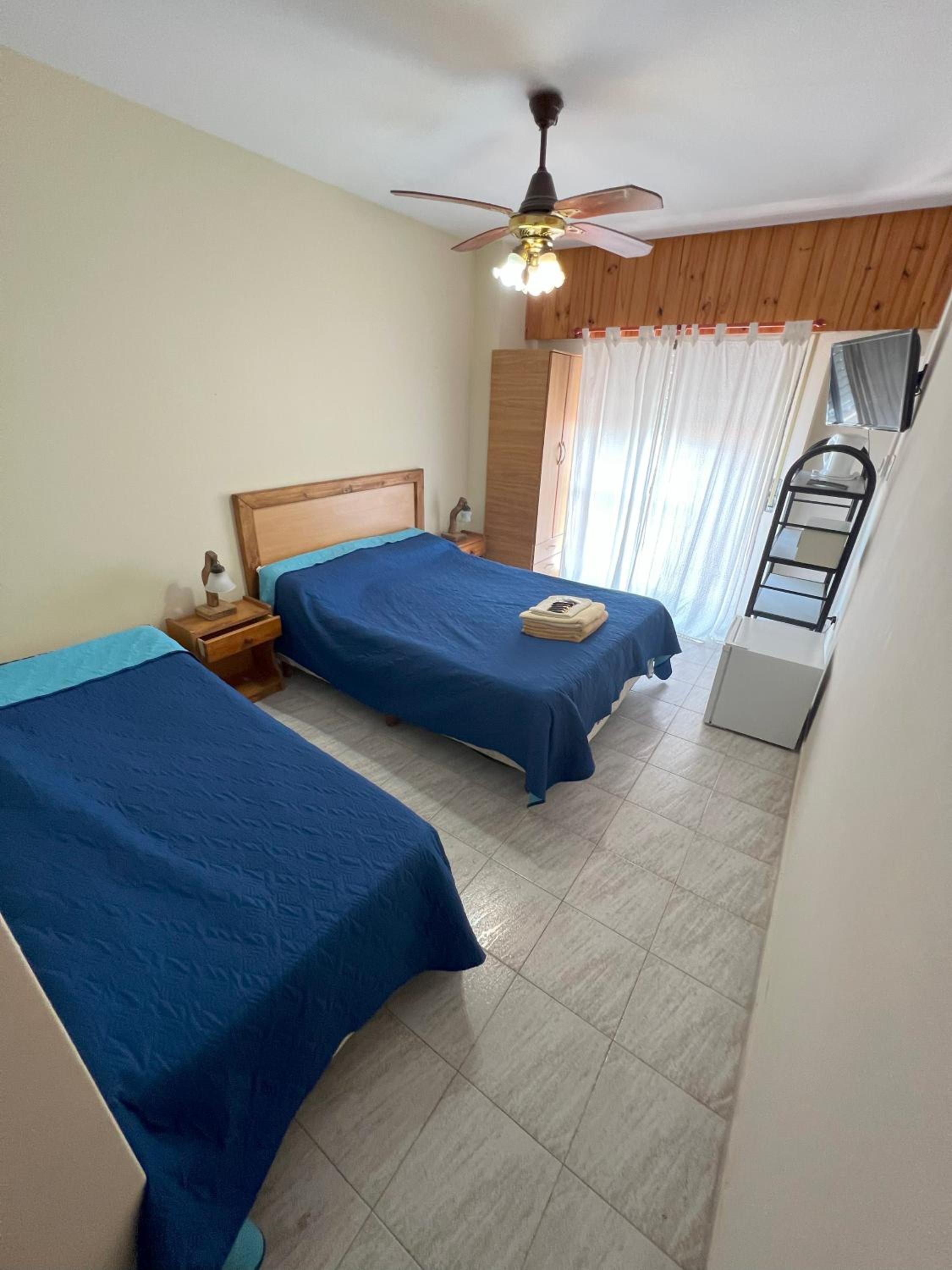 Economy Triple Room photo 2