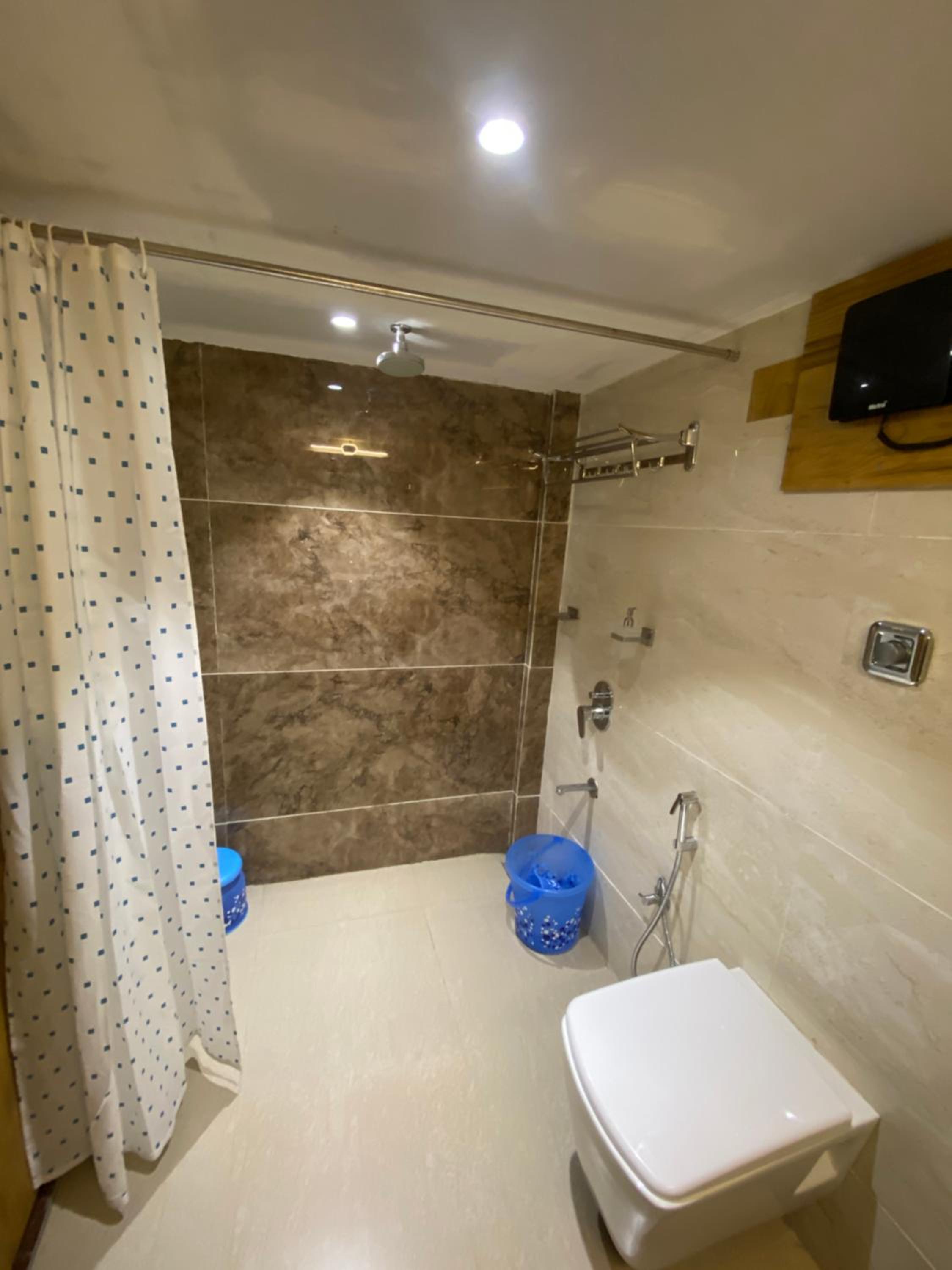 Deluxe Quadruple Room - Photo 9