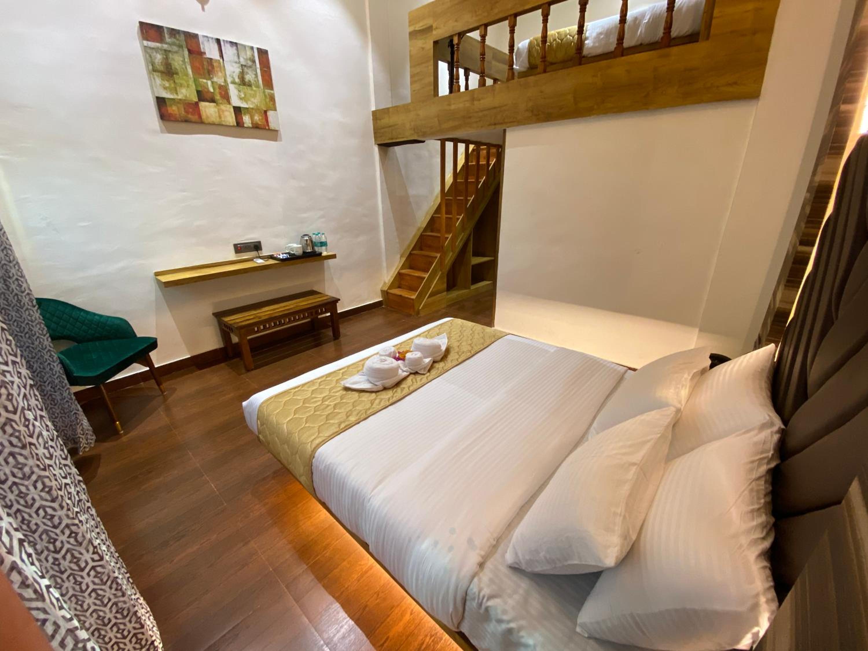 Deluxe Quadruple Room - Photo 18