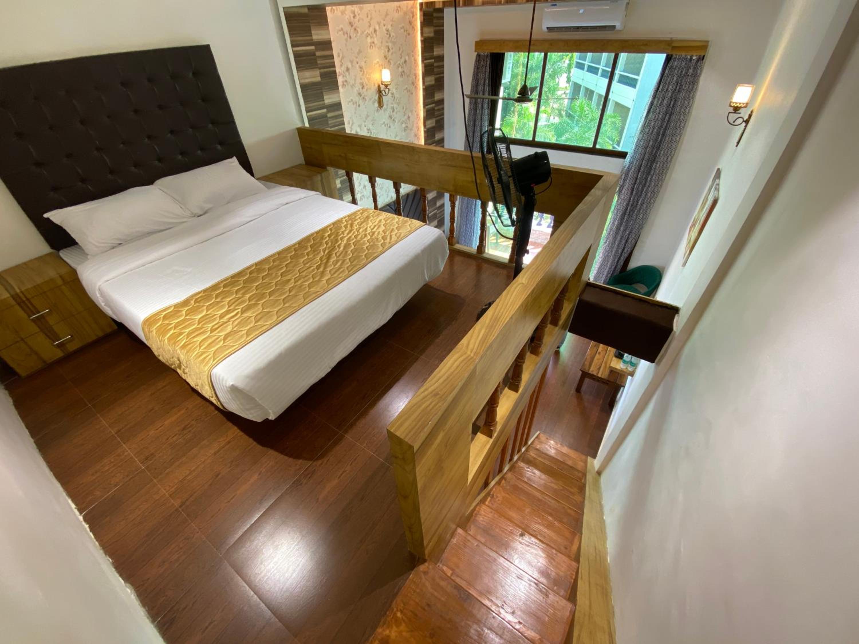 Deluxe Quadruple Room - Photo 5