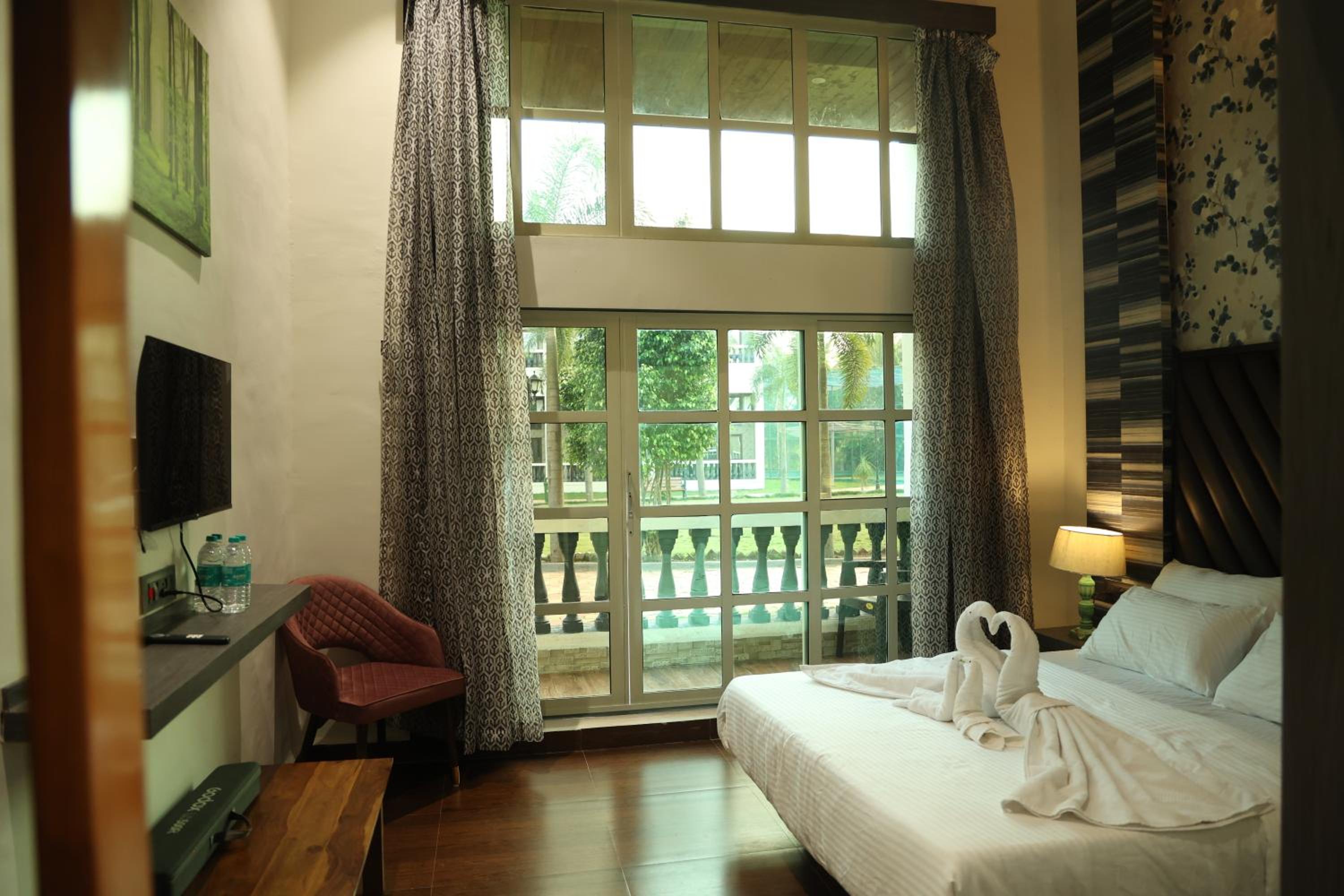 Deluxe Quadruple Room - Photo 15