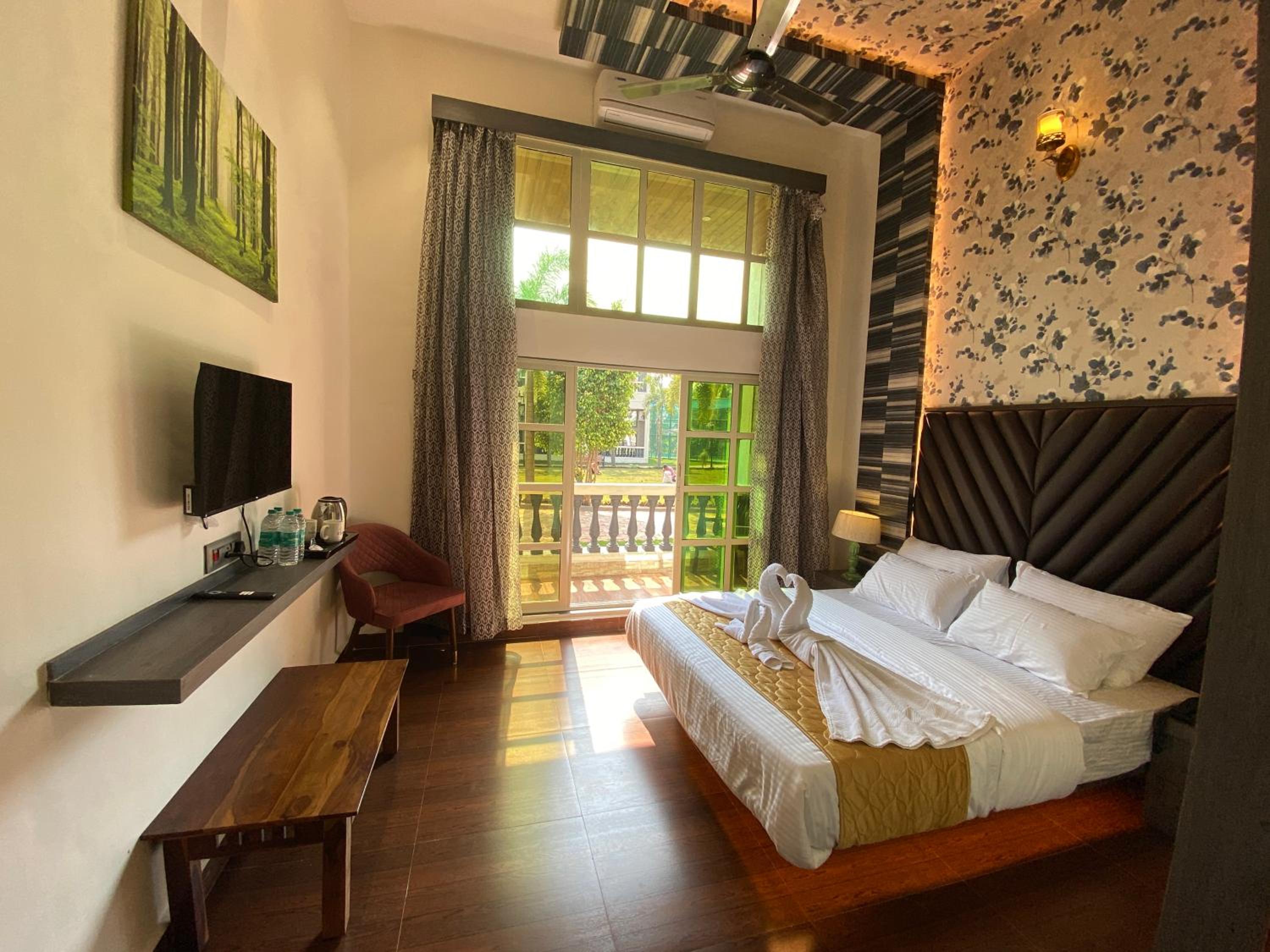 Deluxe Quadruple Room - Photo 13
