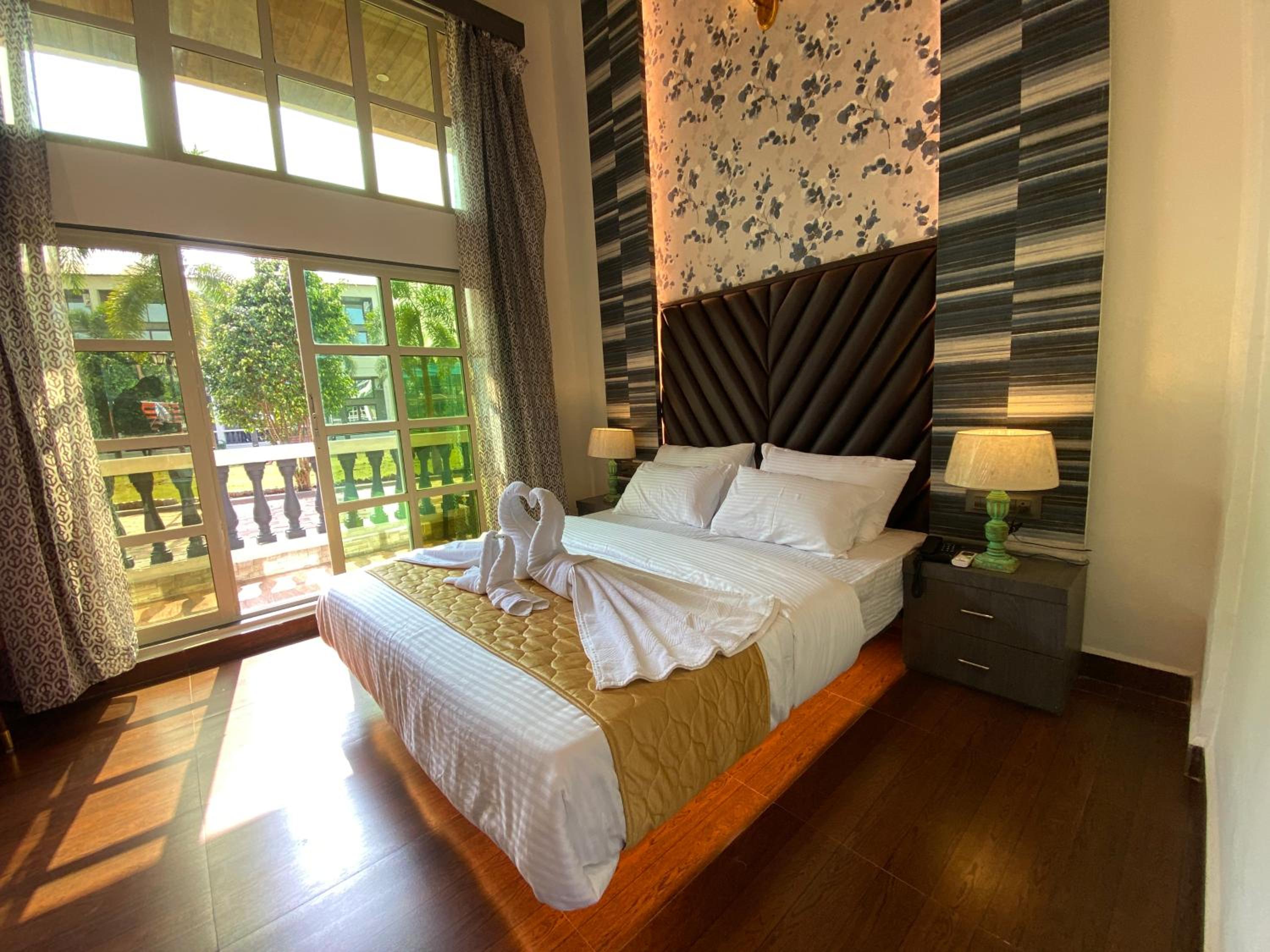 Deluxe Quadruple Room - Photo 17