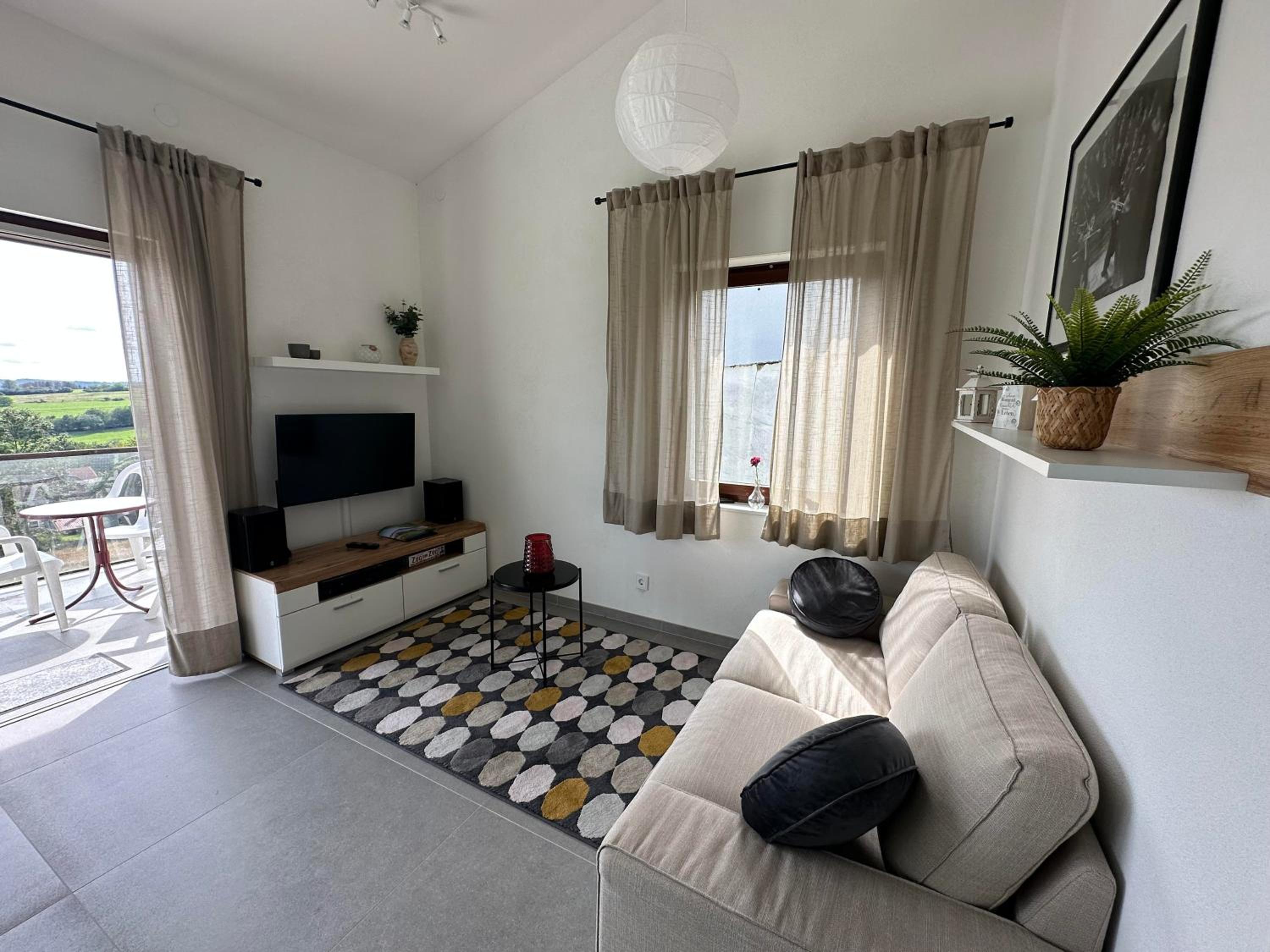 Three-Bedroom Apartment photo 1