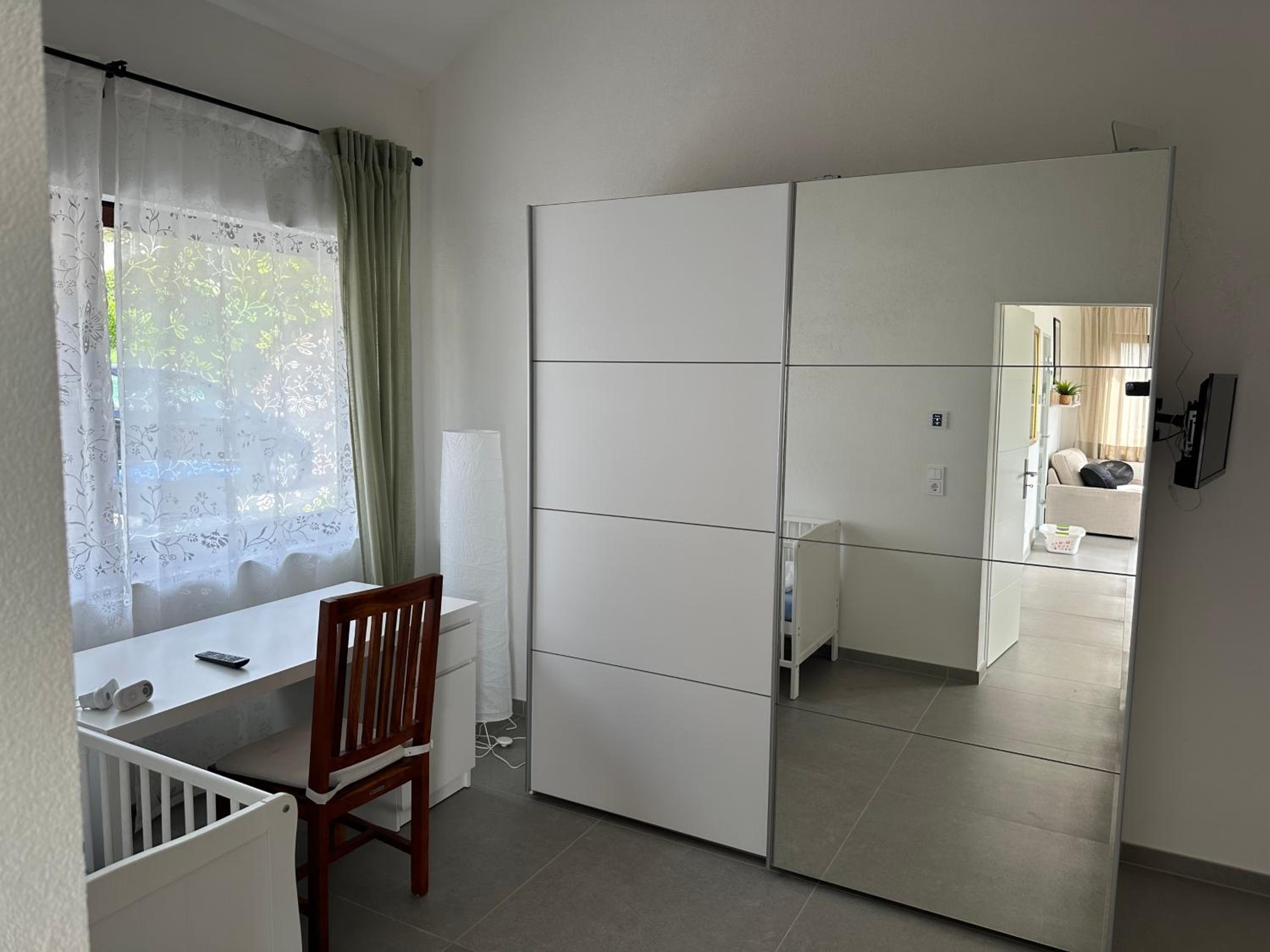 Three-Bedroom Apartment photo 2