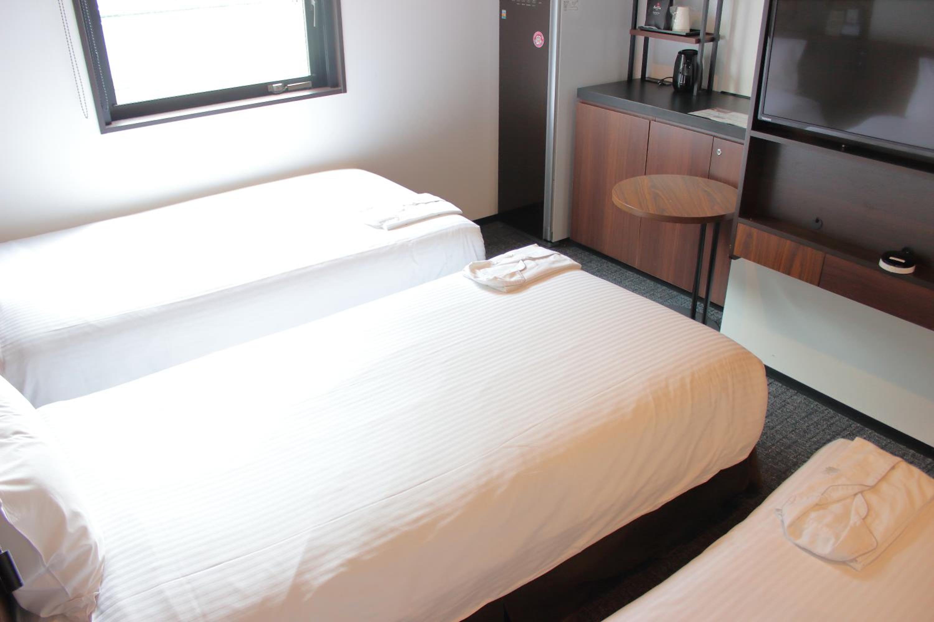 Triple Room - (LG Styler) - Non-Smoking photo 2