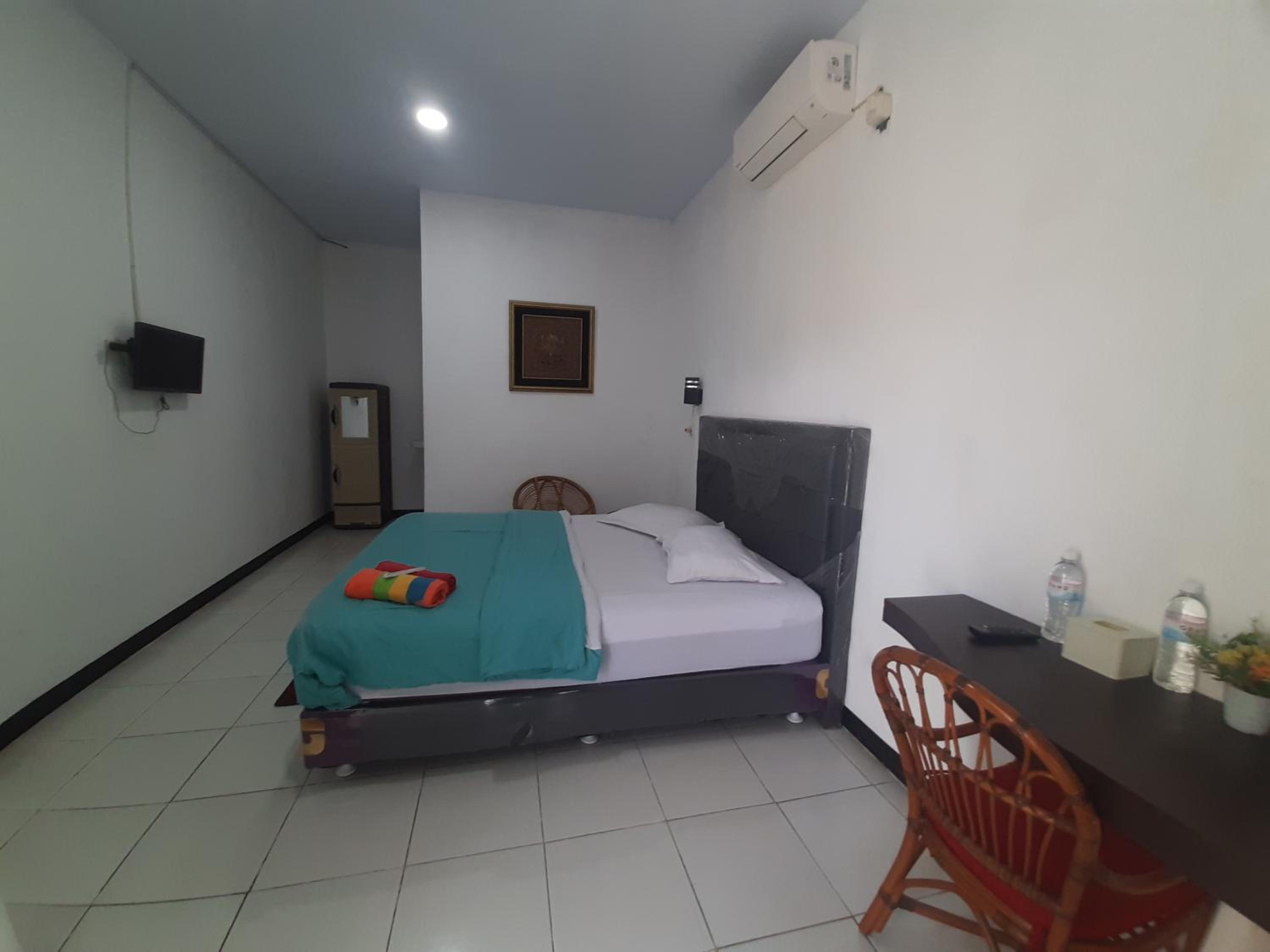 Deluxe Double Room (2 Adults + 1 Child) photo 3
