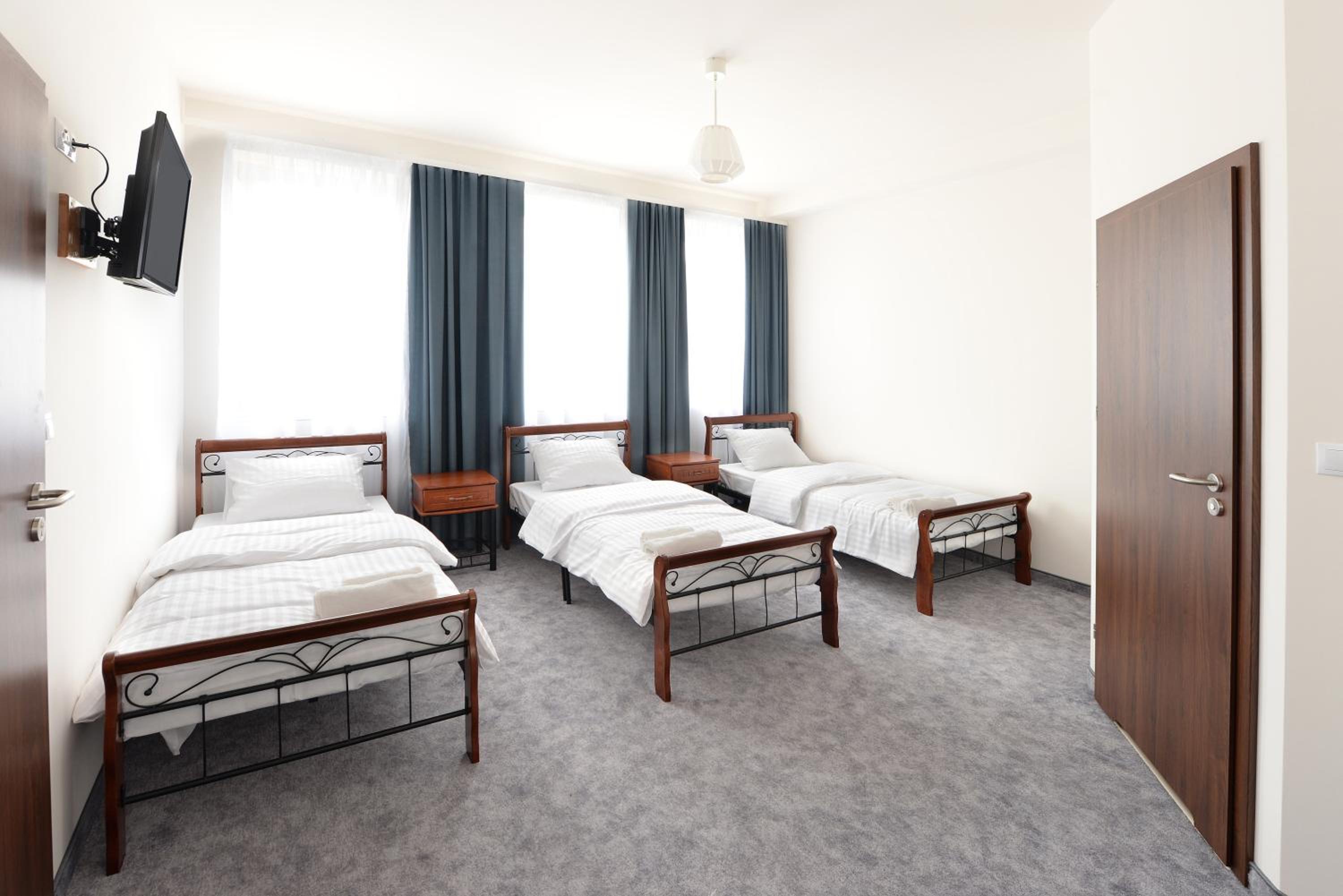 Triple Room - Photo 1