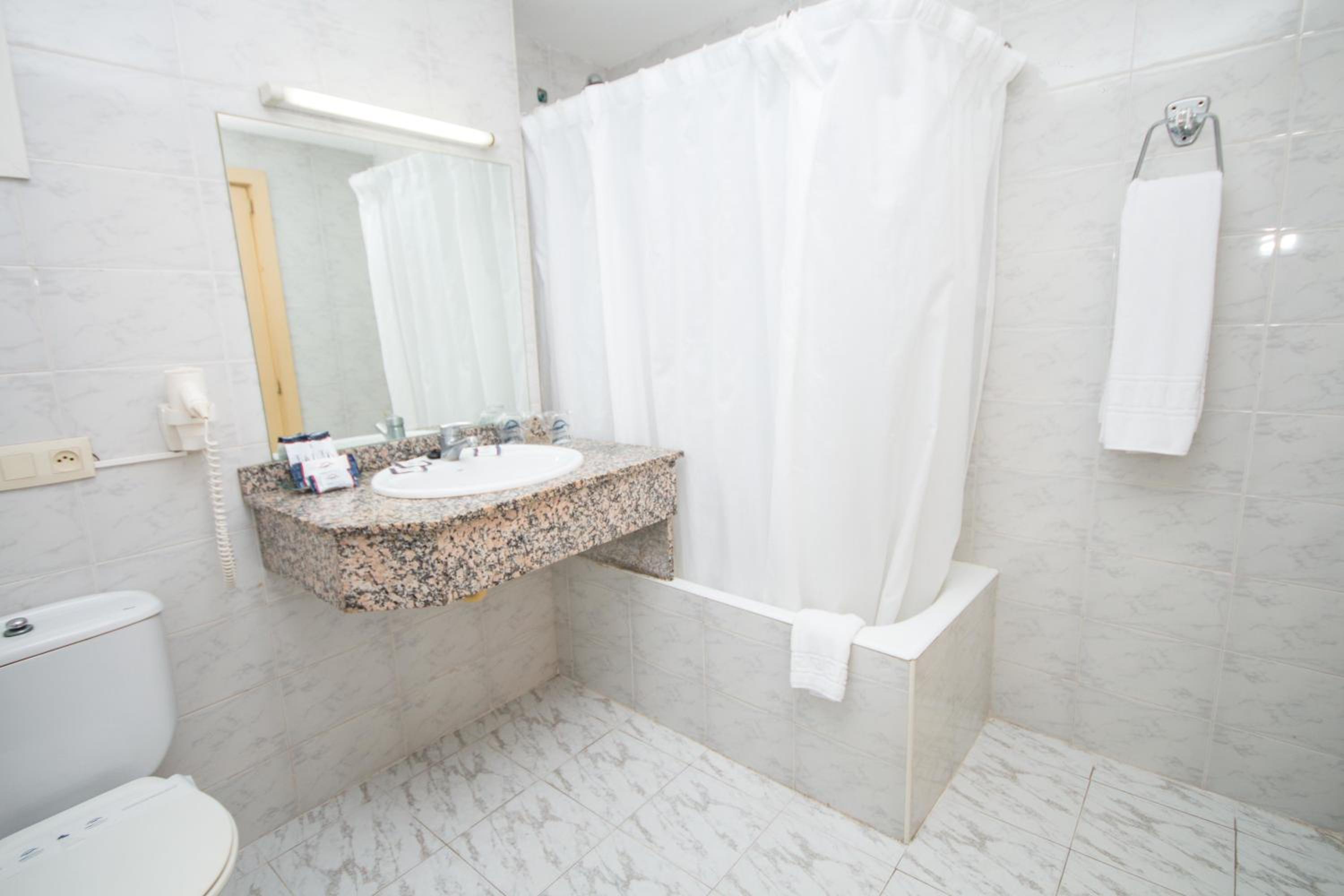 Triple Room (2 Adults + 1 Child)