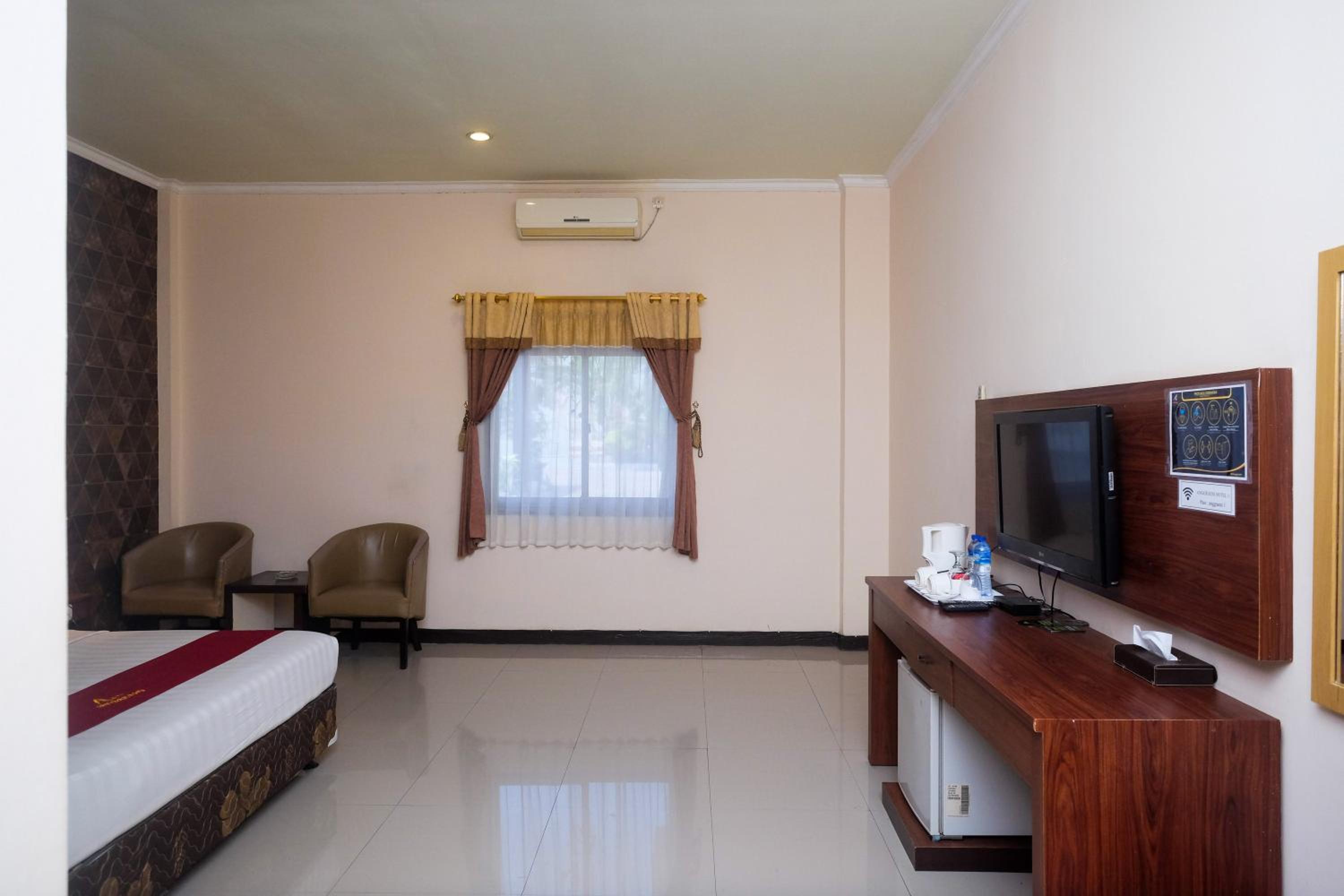 Deluxe Room - Photo 14