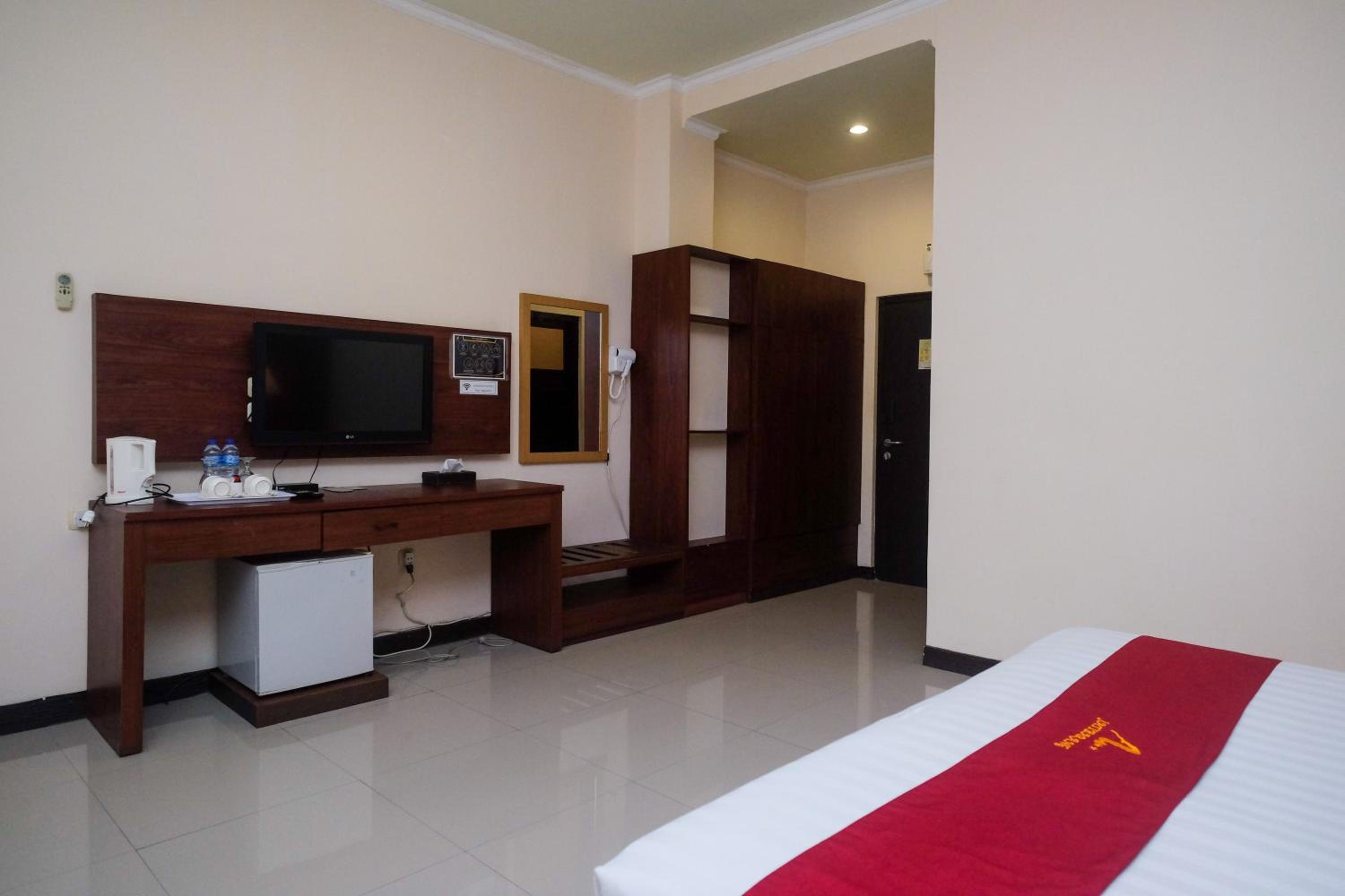 Deluxe Room - Photo 4