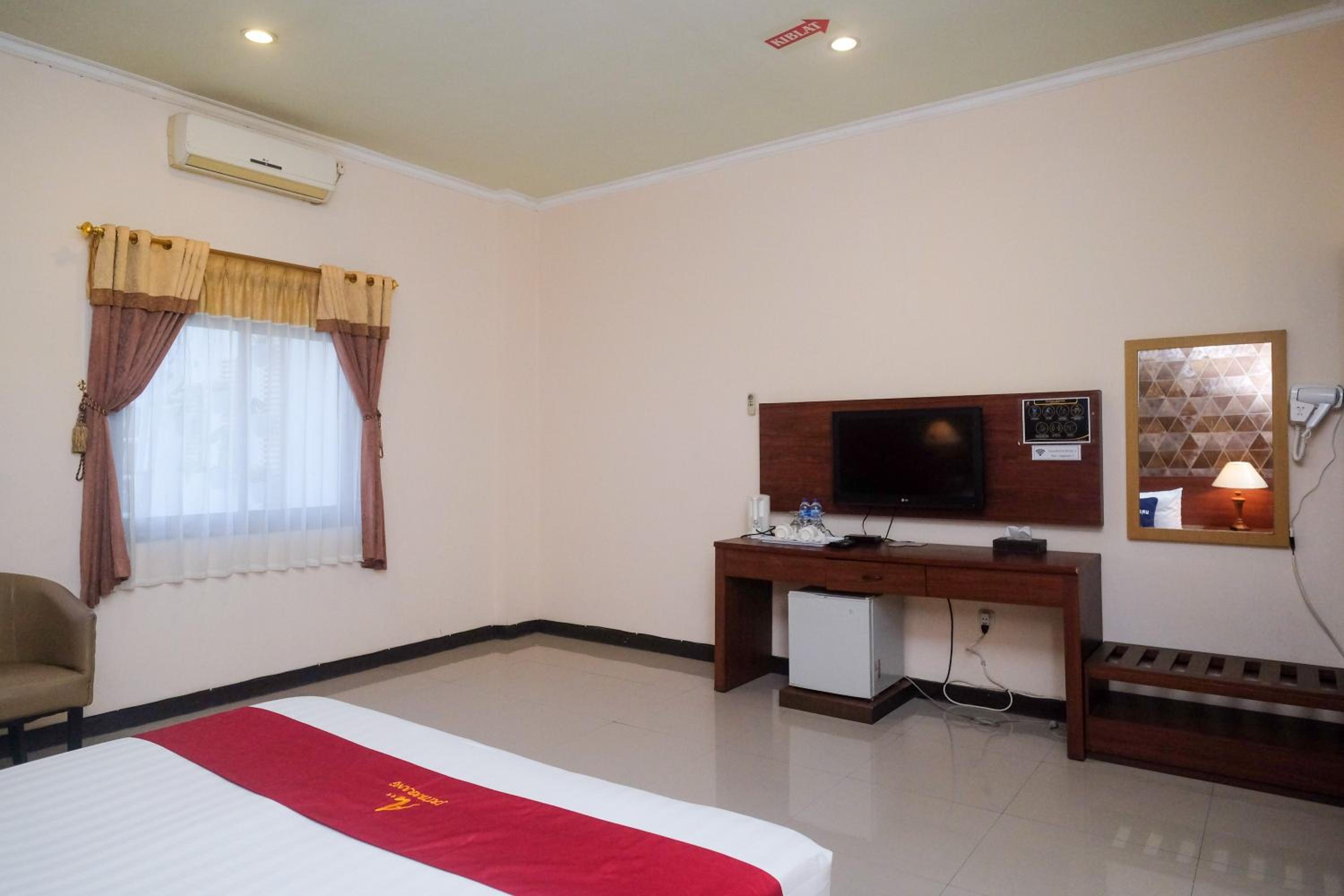 Deluxe Room - Photo 2