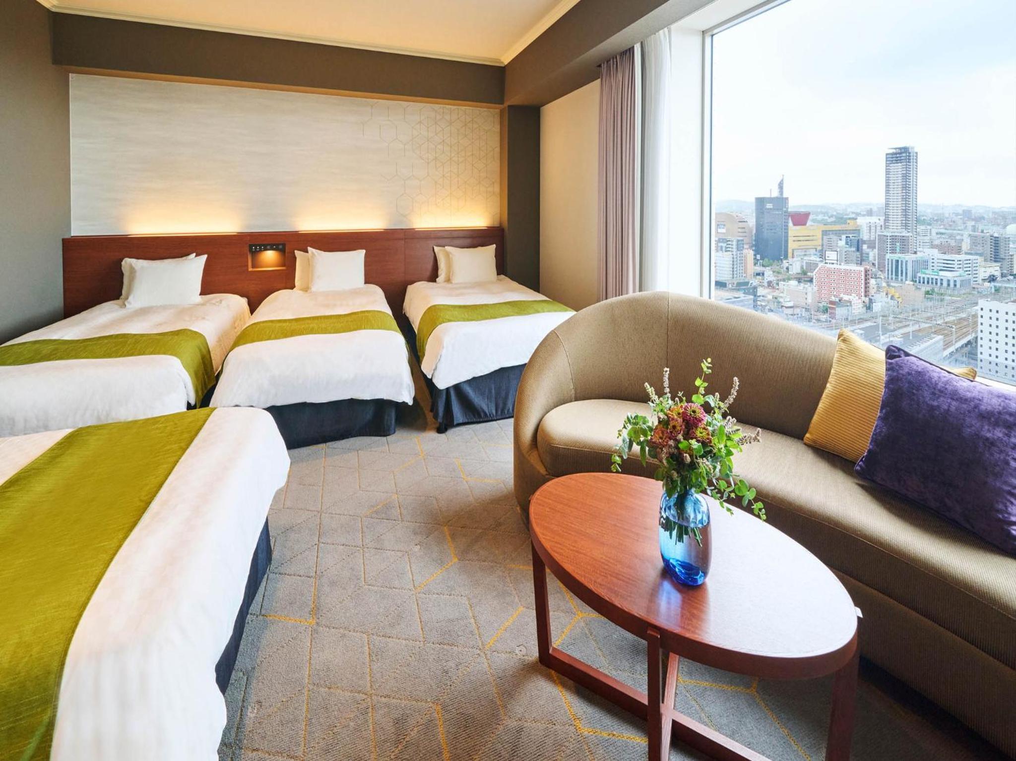Deluxe Twin Room (14th-23rd Superior Floor) - Non-Smoking - Photo 1
