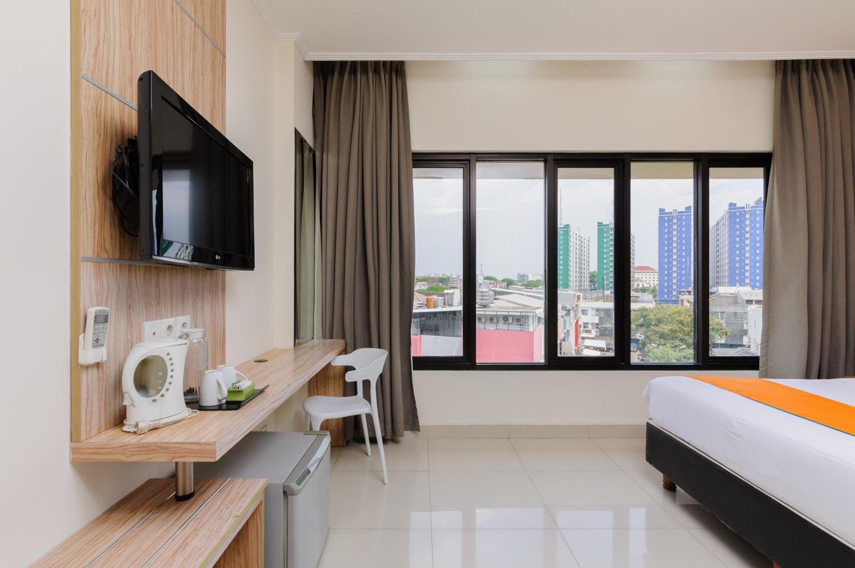 Deluxe Room - Photo 9