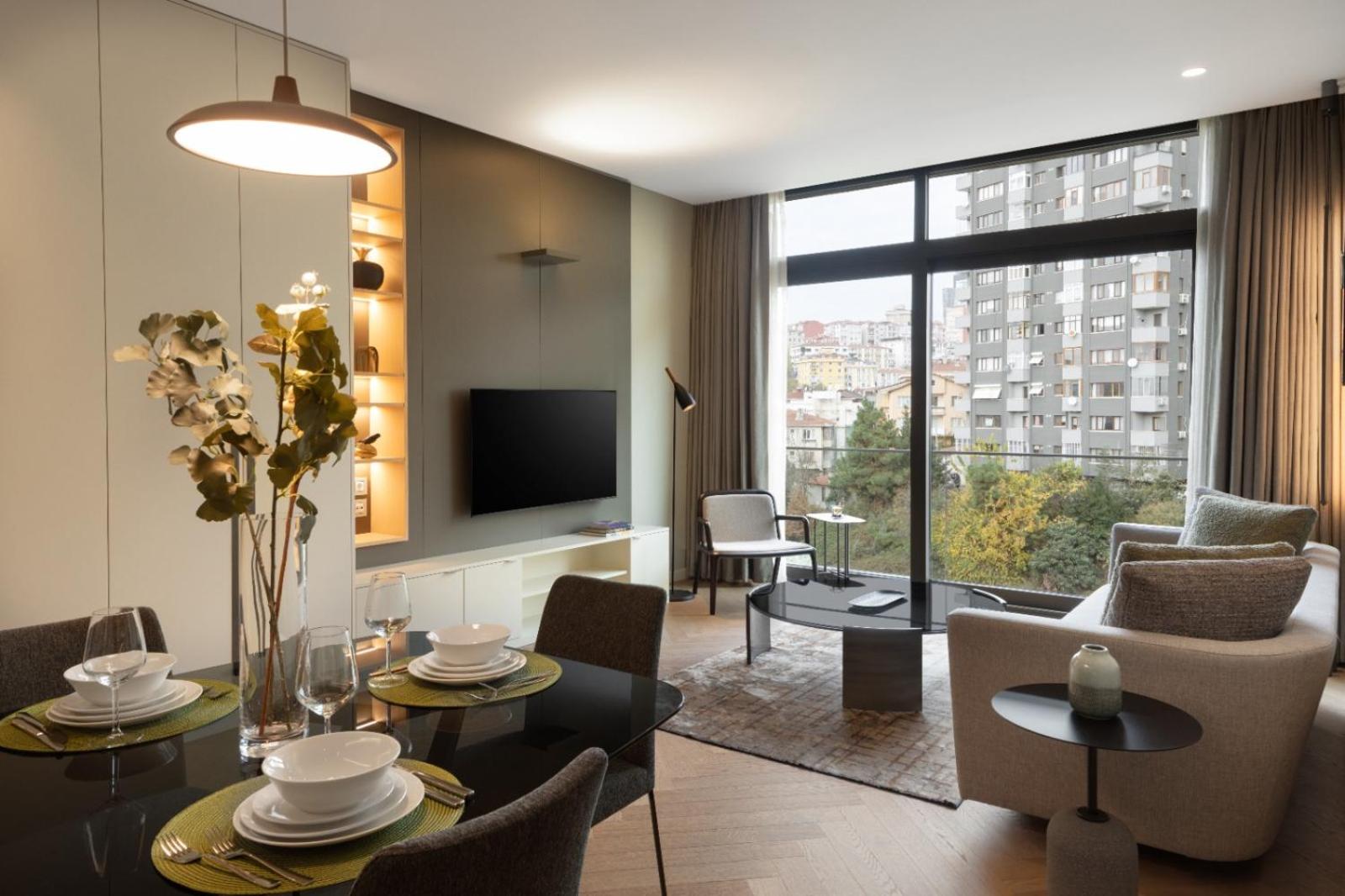 Three-Bedroom Apartment with Balcony and City View