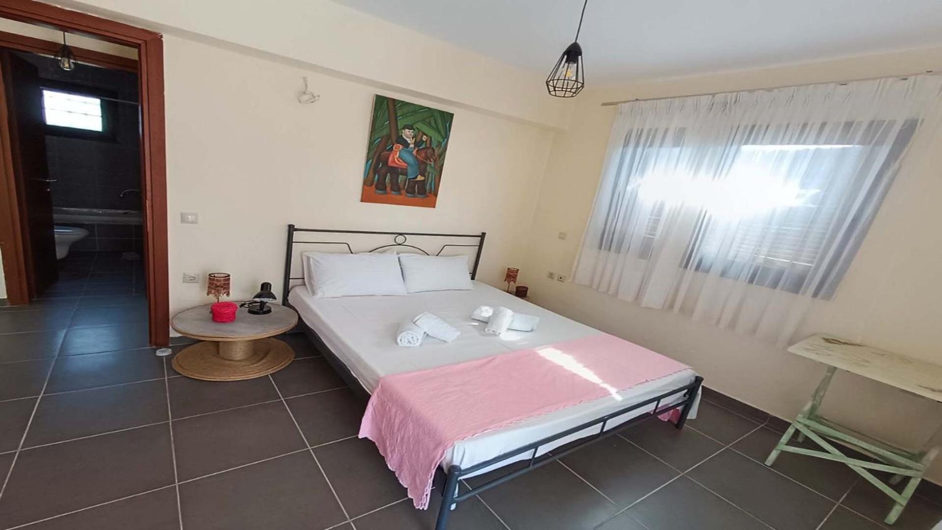 Three-Bedroom House photo 1