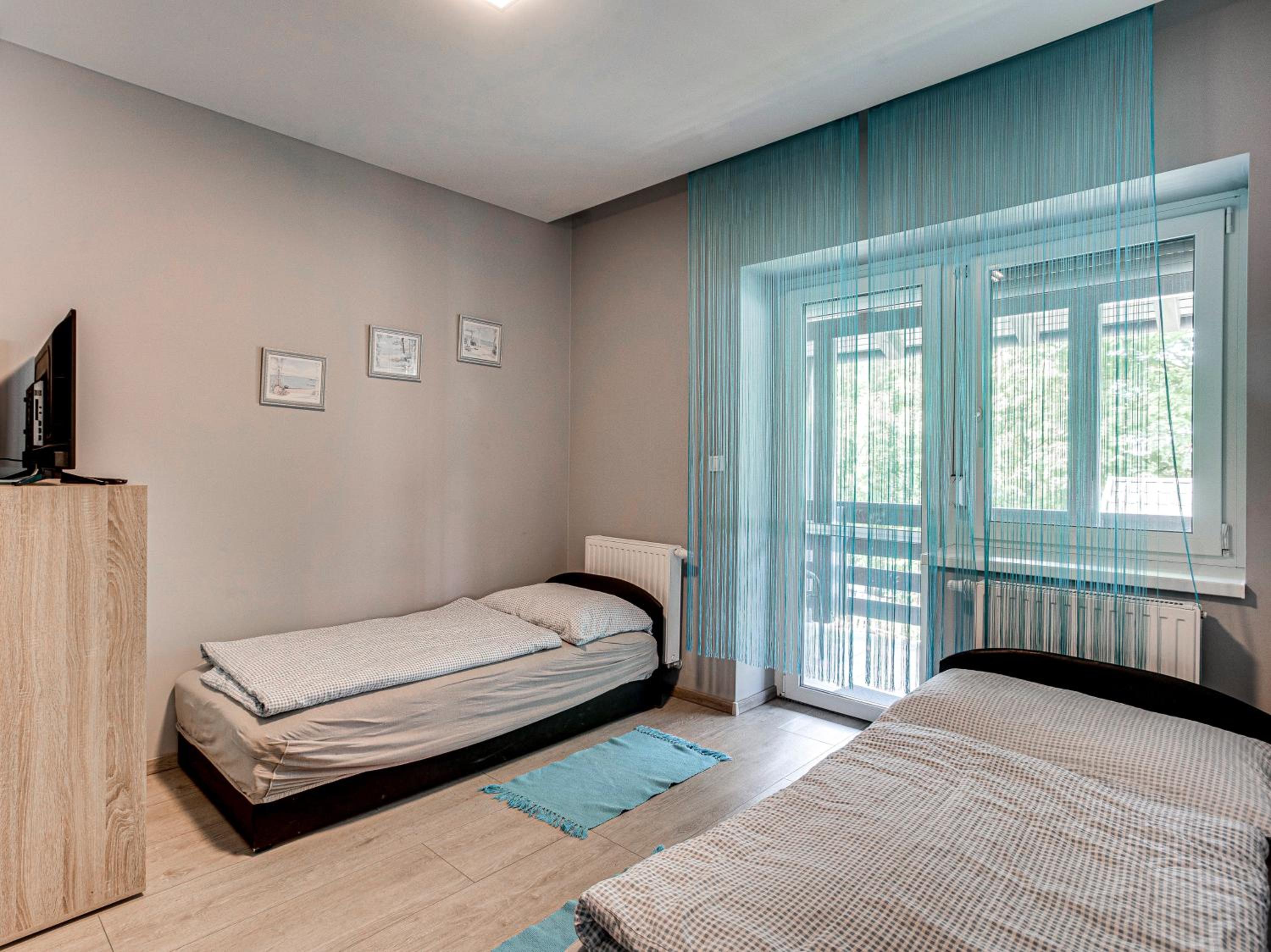 Apartment with Balcony - Photo 8