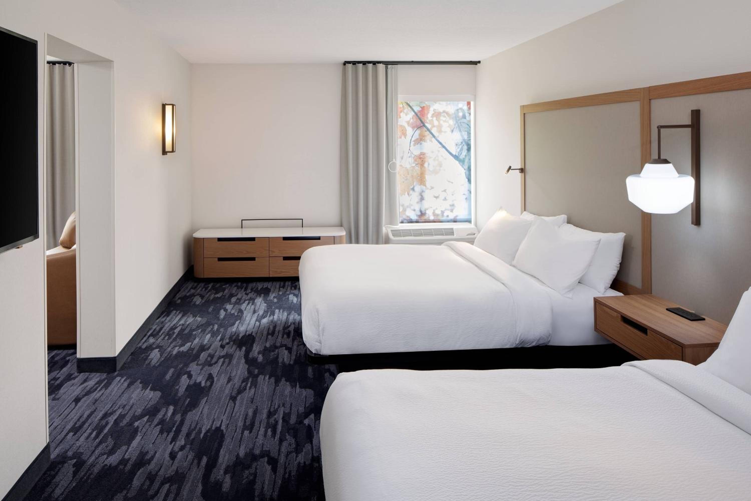 Queen Suite with Two Queen Beds, Roll-In Shower, Sofa Bed and Sitting Area - Mobility Access/Hearing Accessible - Photo 1