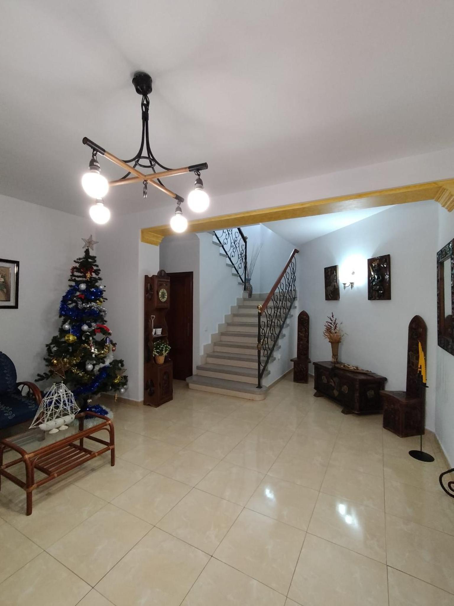 Three-Bedroom House - Photo 32