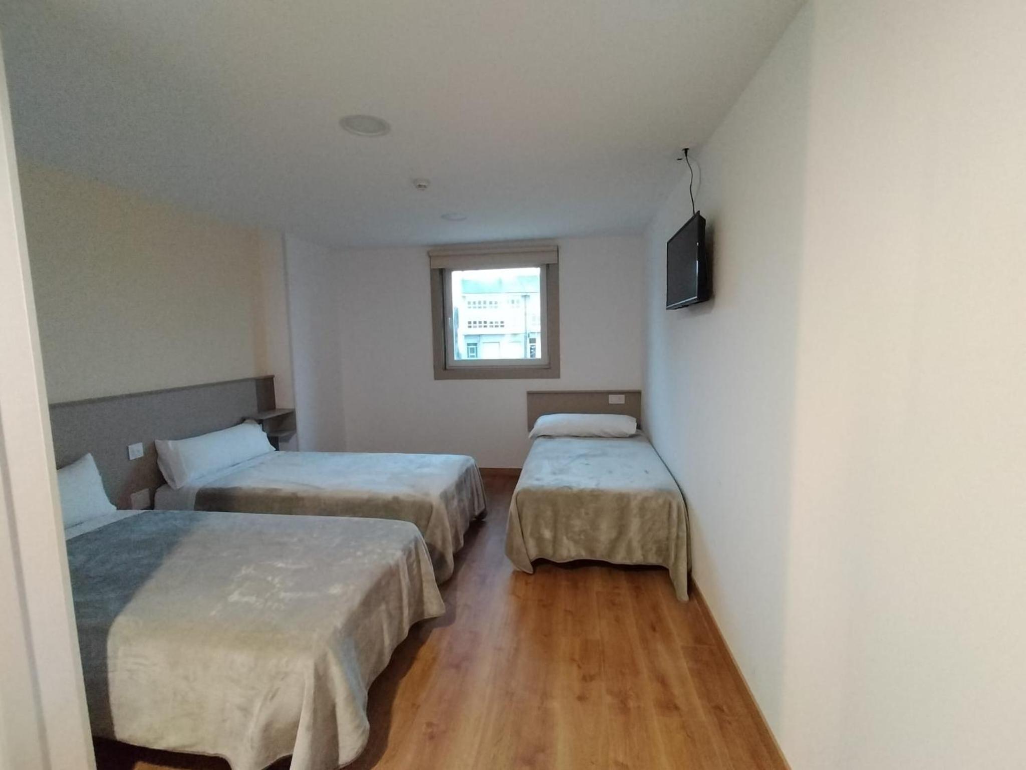 Habitación Triple con Baño Privado