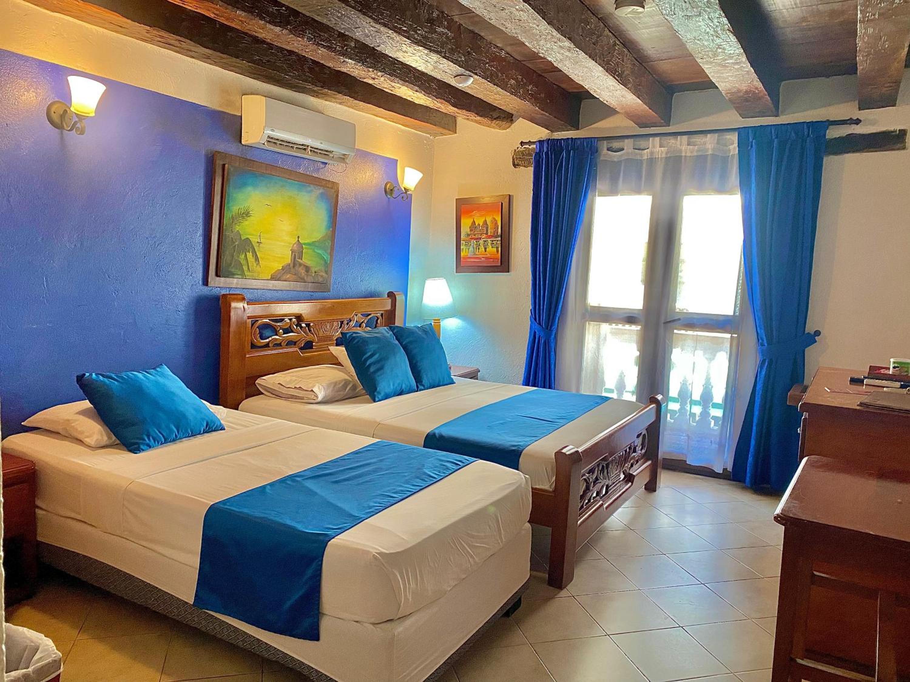 Deluxe Room with Balcony - Photo 1
