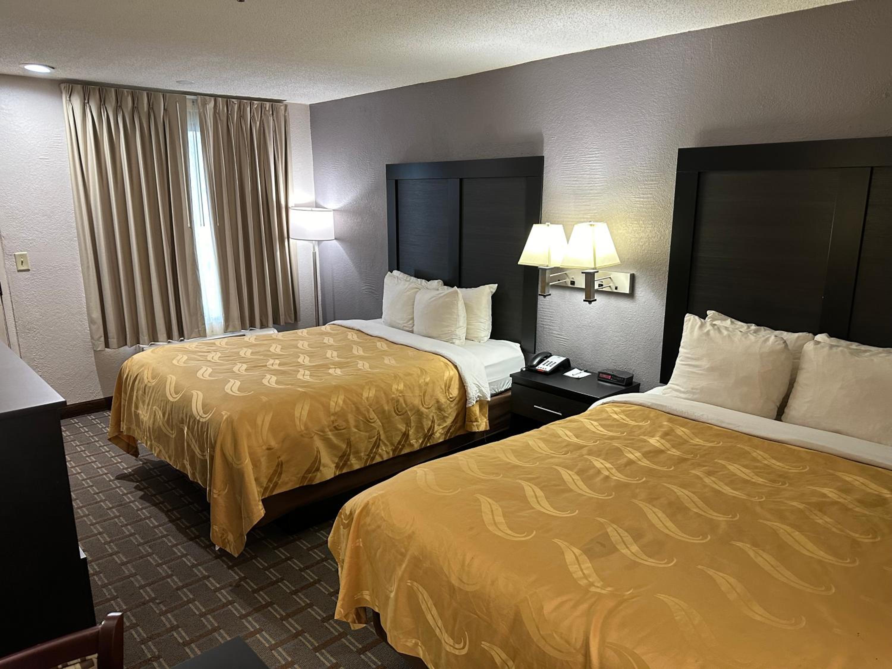 Queen Room with Two Queen Beds - Smoking - Photo 1