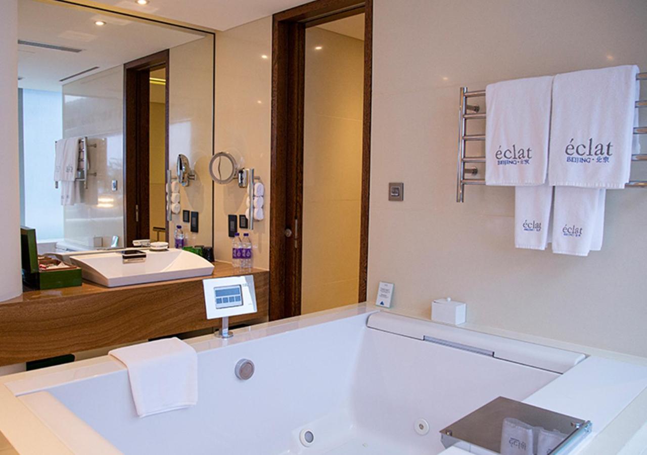 bathroom with a jacuzzi tub in the middle