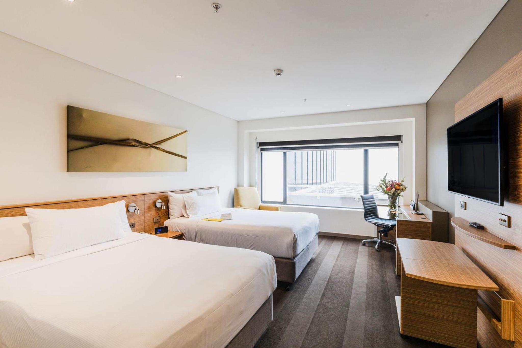 Twin Room with Two Double Beds - Mobility Accessible - Photo 2