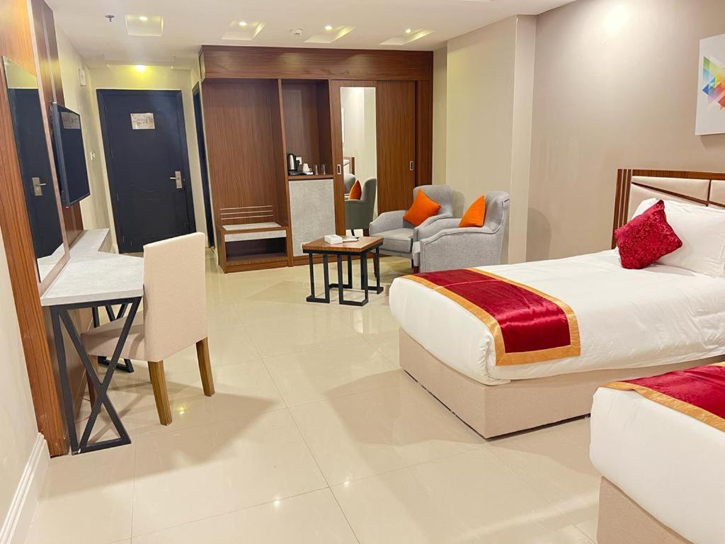 Deluxe Room - Photo 2