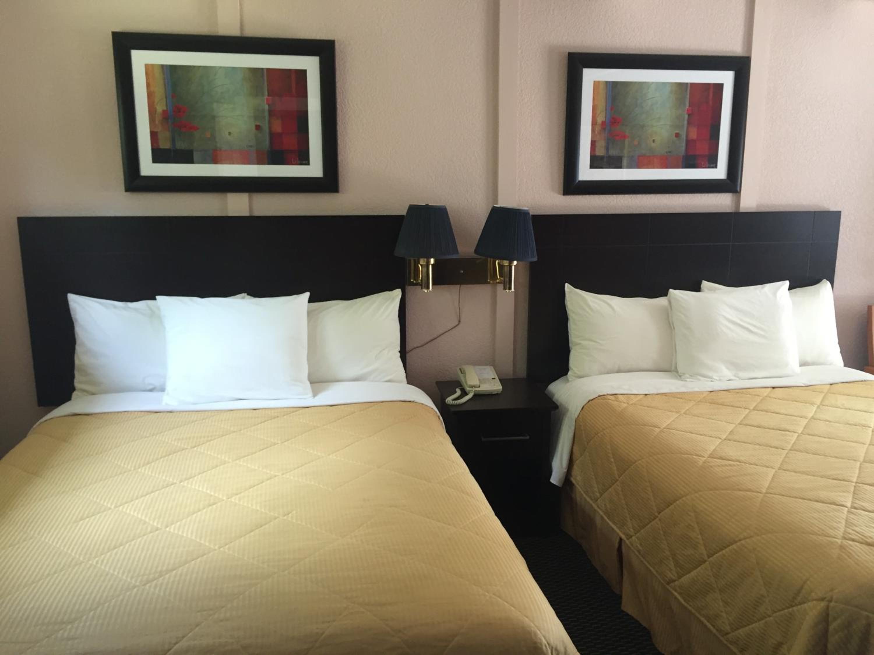 Queen Room with Two Queen Beds and Sofa Bed photo 1