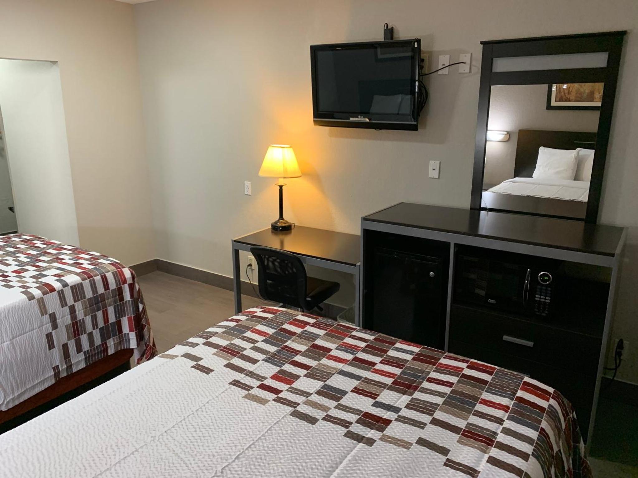 Deluxe Room with Two Double Beds Non-Smoking - Photo 1