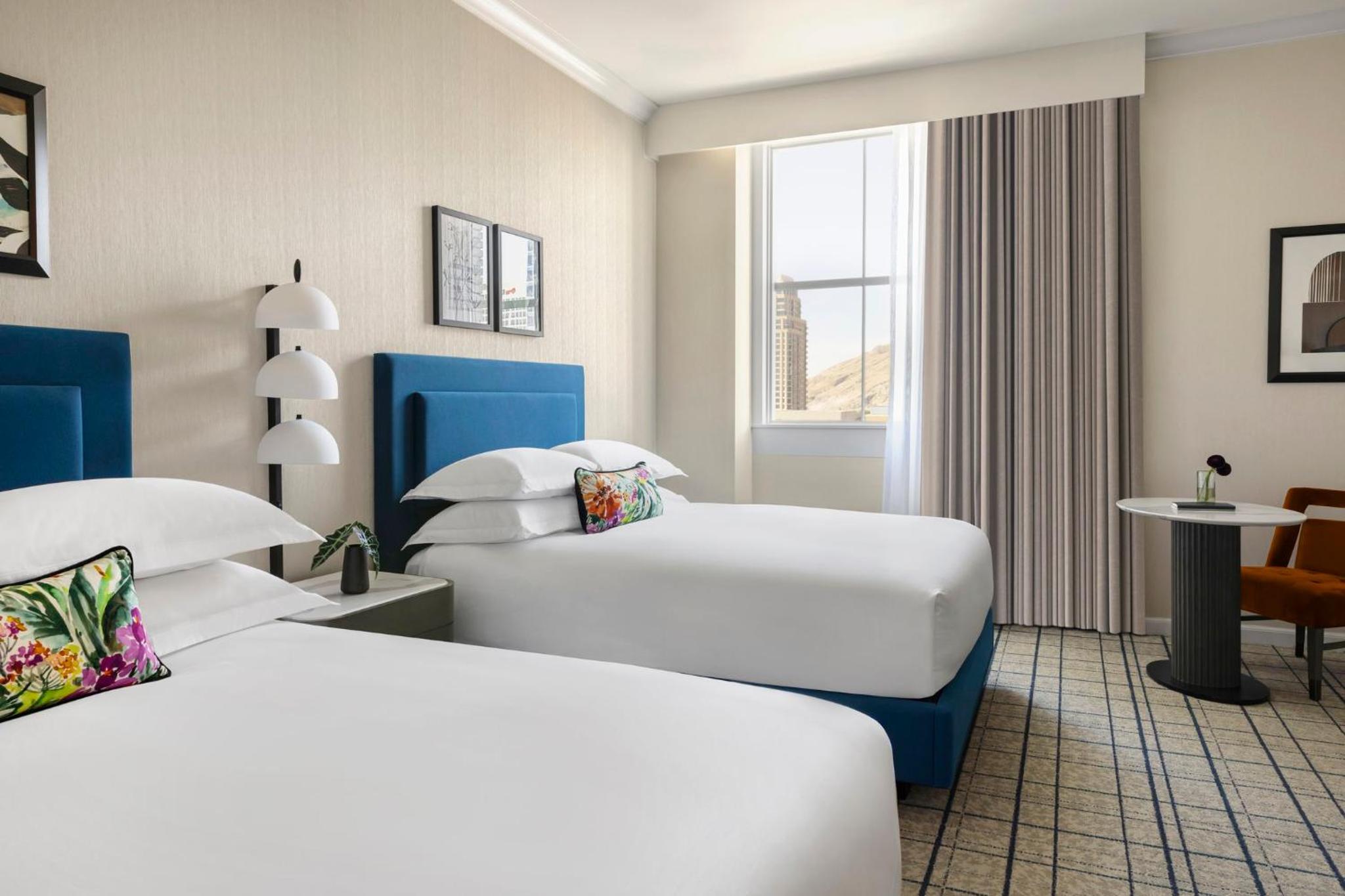 Essential Queen Room with Two Queen Beds and City View photo 1